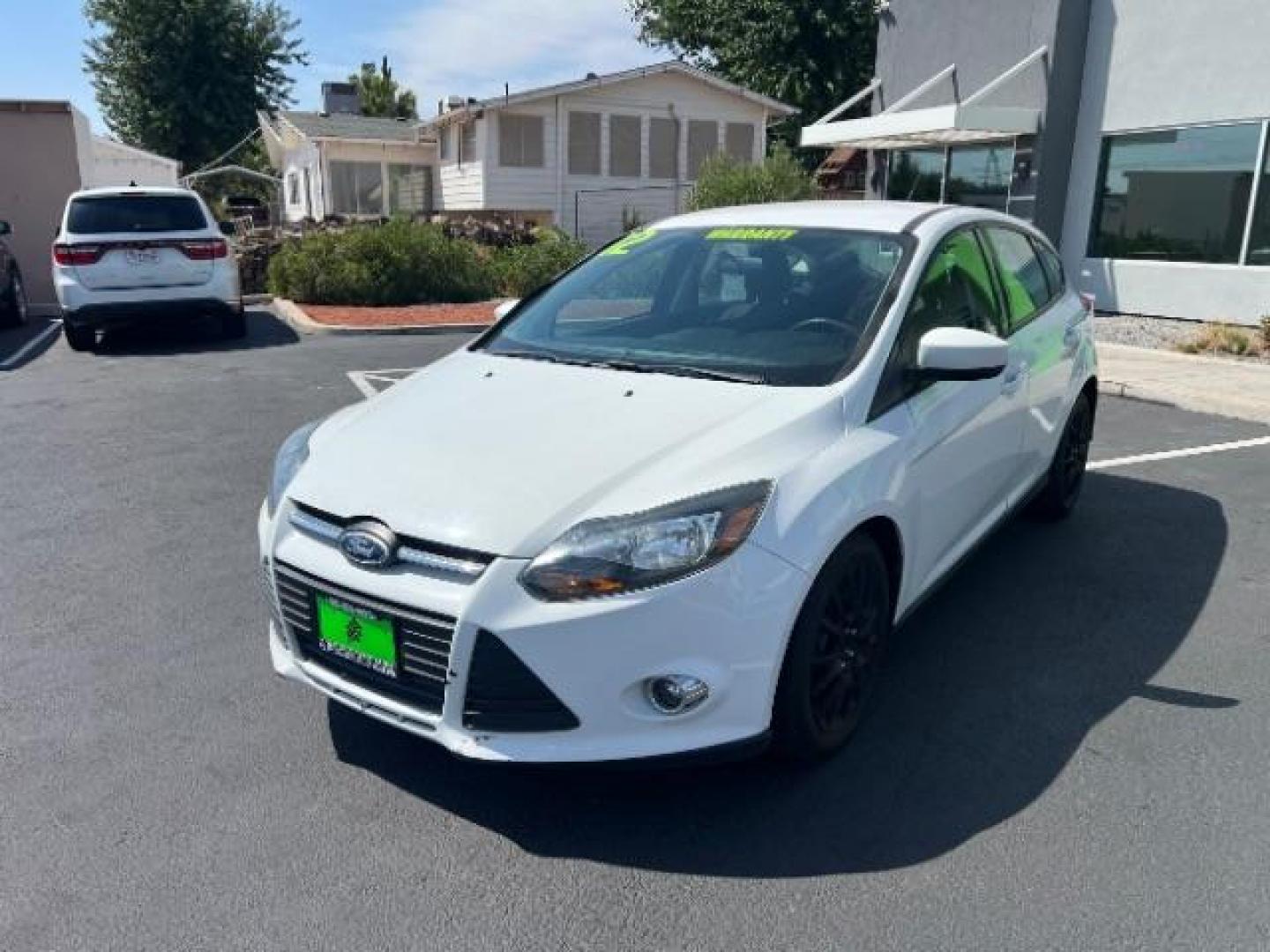 2012 Oxford White /Charcoal Black/Metal Gray Cloth Interior Ford Focus SE (1FAHP3K27CL) with an 2.0L L4 DOHC 16V engine, 6-Speed Automatic transmission, located at 1865 East Red Hills Pkwy, St. George, 84770, (435) 628-0023, 37.120850, -113.543640 - Photo#2