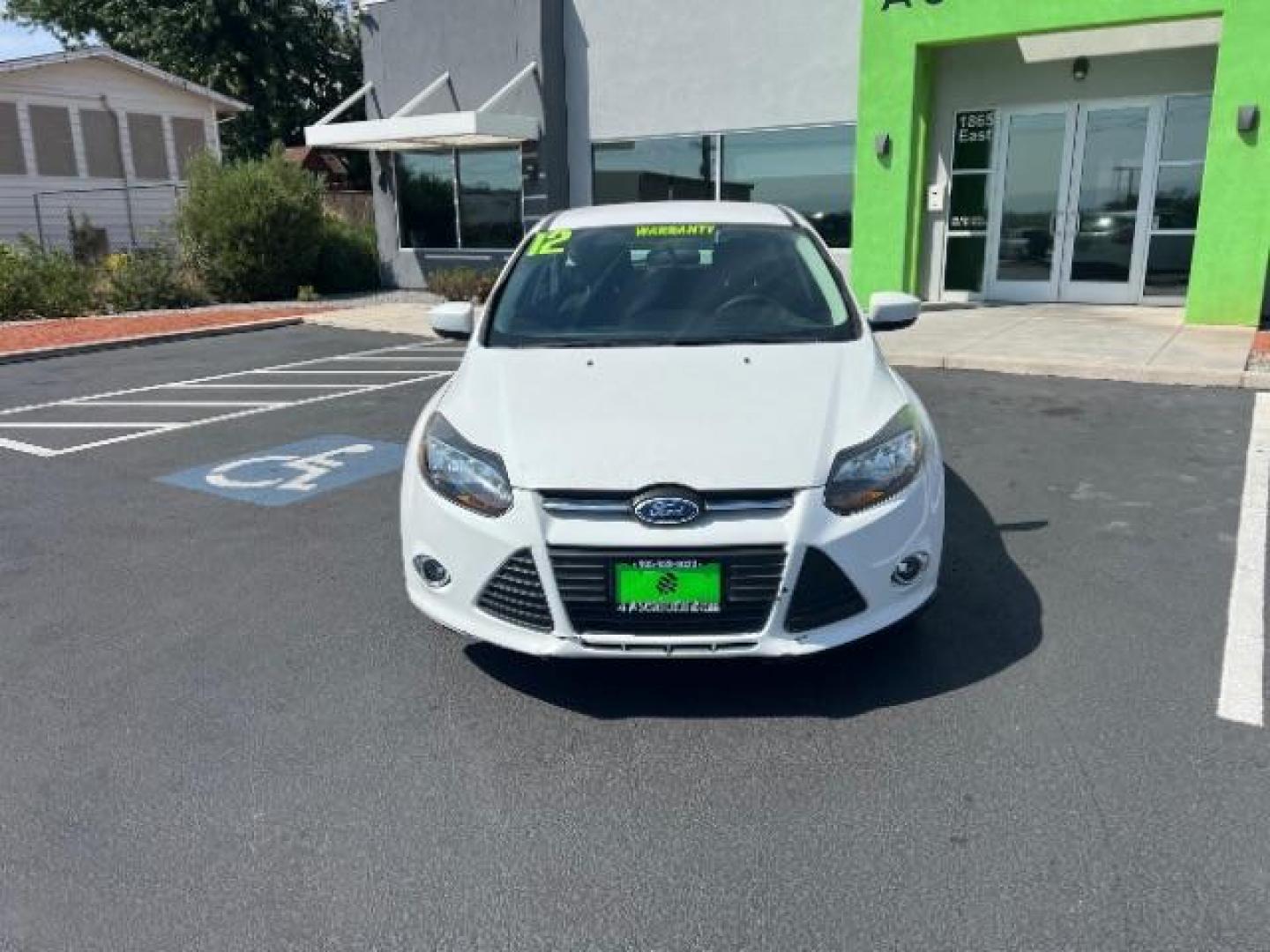 2012 Oxford White /Charcoal Black/Metal Gray Cloth Interior Ford Focus SE (1FAHP3K27CL) with an 2.0L L4 DOHC 16V engine, 6-Speed Automatic transmission, located at 1865 East Red Hills Pkwy, St. George, 84770, (435) 628-0023, 37.120850, -113.543640 - Photo#1