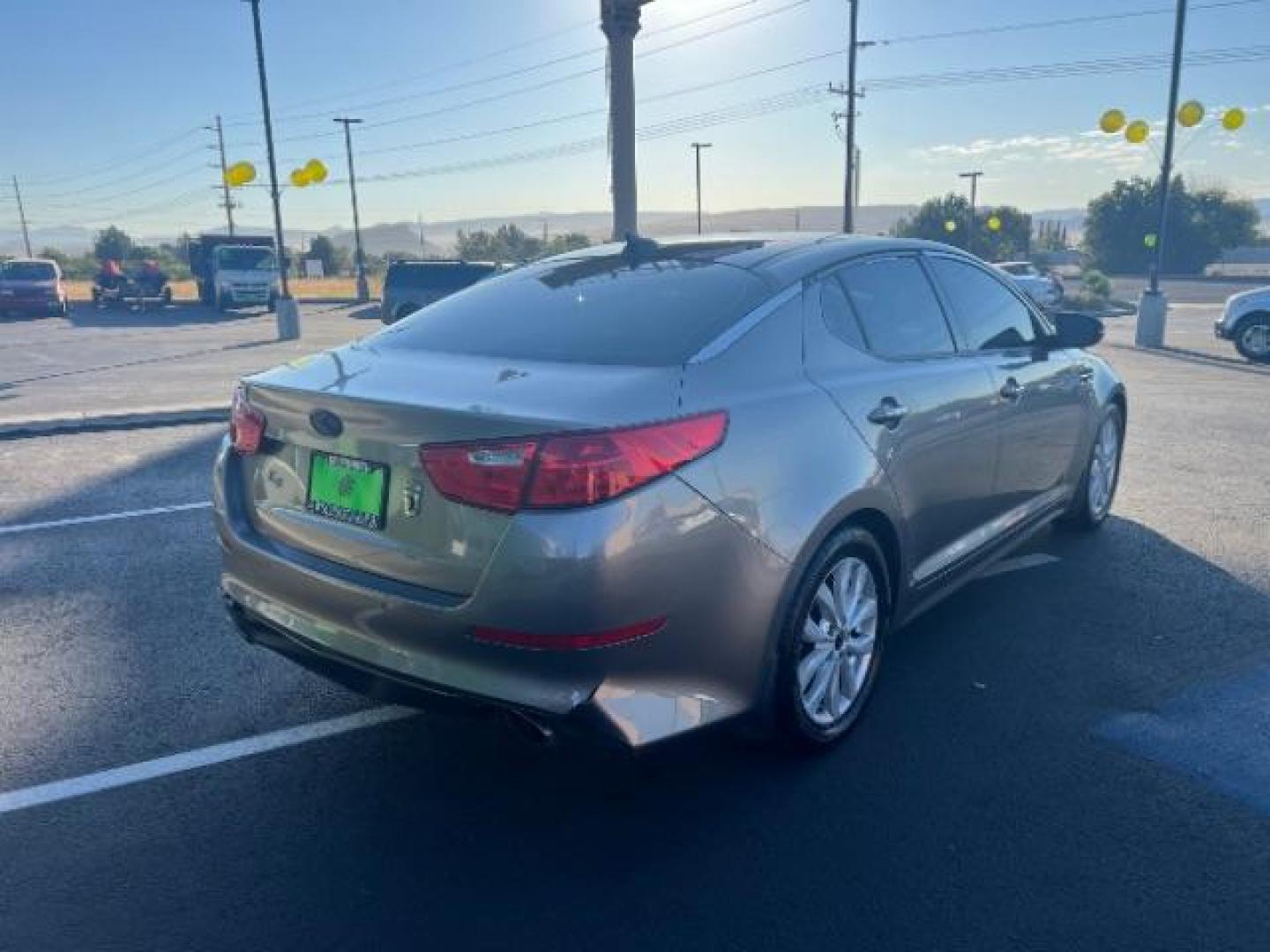 2015 Satin Metal /Beige Kia Optima EX (5XXGN4A71FG) with an 2.4L L4 DOHC 16V engine, 6-Speed Automatic transmission, located at 1865 East Red Hills Pkwy, St. George, 84770, (435) 628-0023, 37.120850, -113.543640 - We specialize in helping ALL people get the best financing available. No matter your credit score, good, bad or none we can get you an amazing rate. Had a bankruptcy, divorce, or repossessions? We give you the green light to get your credit back on the road. Low down and affordable payments that fit - Photo#6