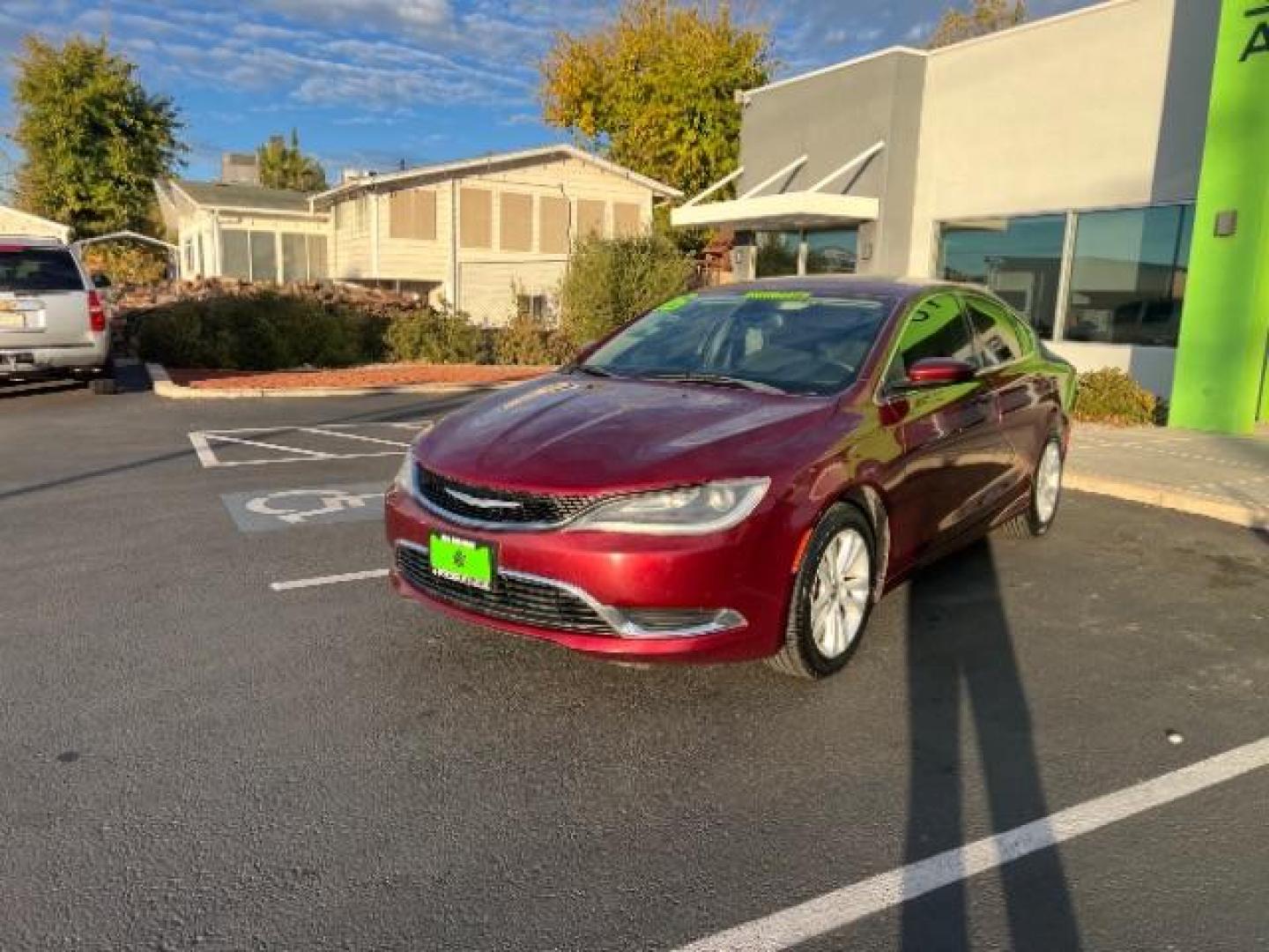 2016 Velvet Red Pearl Coa /Black, premium cloth Chrysler 200 Limited (1C3CCCAB9GN) with an 2.4L L4 DOHC 16V engine, 9-Speed Automatic transmission, located at 940 North Main Street, Cedar City, UT, 84720, (435) 628-0023, 37.692936, -113.061897 - We specialize in helping ALL people get the best financing available. No matter your credit score, good, bad or none we can get you an amazing rate. Had a bankruptcy, divorce, or repossessions? We give you the green light to get your credit back on the road. Low down and affordable payments that fit - Photo#2