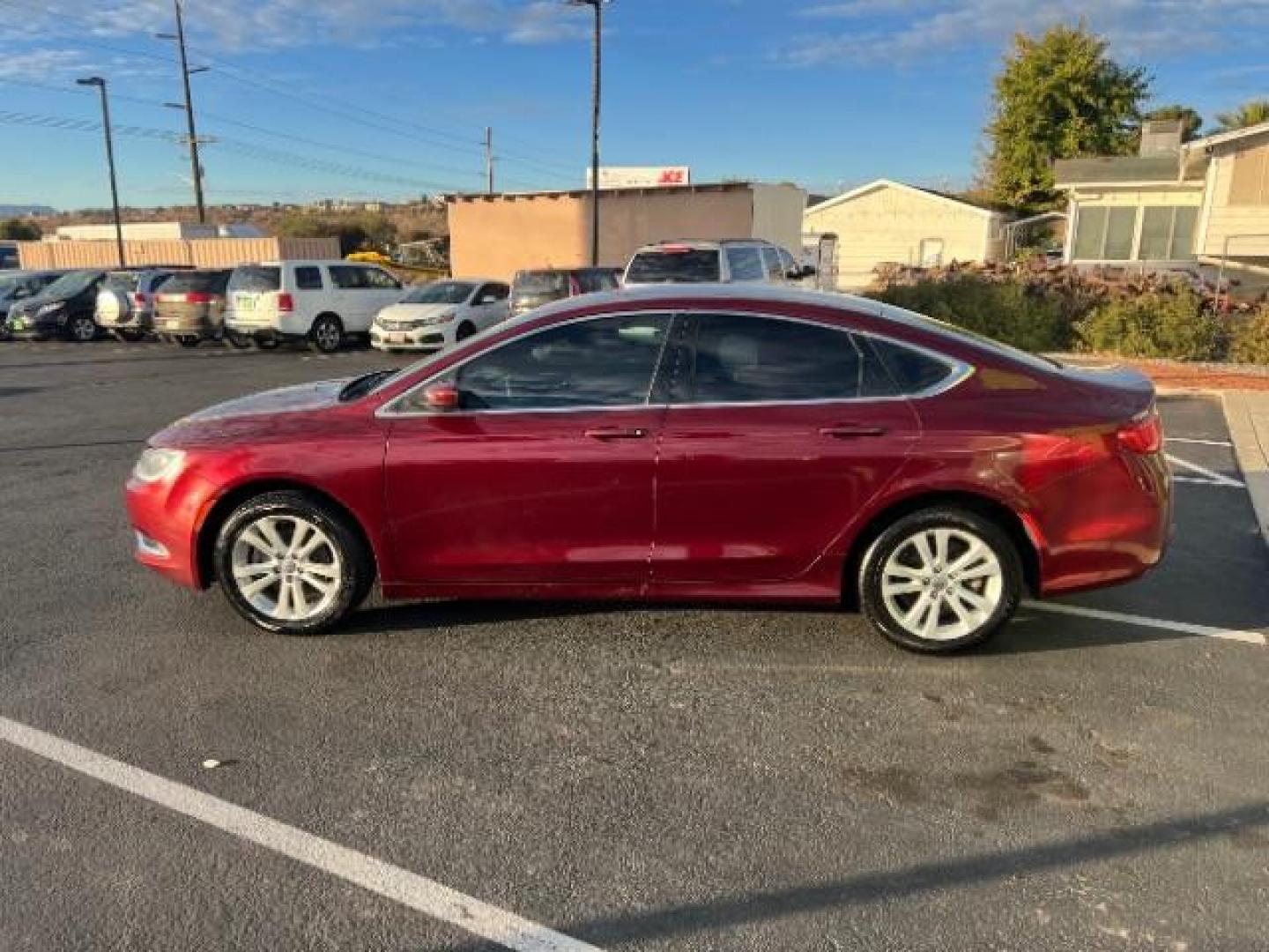 2016 Velvet Red Pearl Coa /Black, premium cloth Chrysler 200 Limited (1C3CCCAB9GN) with an 2.4L L4 DOHC 16V engine, 9-Speed Automatic transmission, located at 940 North Main Street, Cedar City, UT, 84720, (435) 628-0023, 37.692936, -113.061897 - We specialize in helping ALL people get the best financing available. No matter your credit score, good, bad or none we can get you an amazing rate. Had a bankruptcy, divorce, or repossessions? We give you the green light to get your credit back on the road. Low down and affordable payments that fit - Photo#3