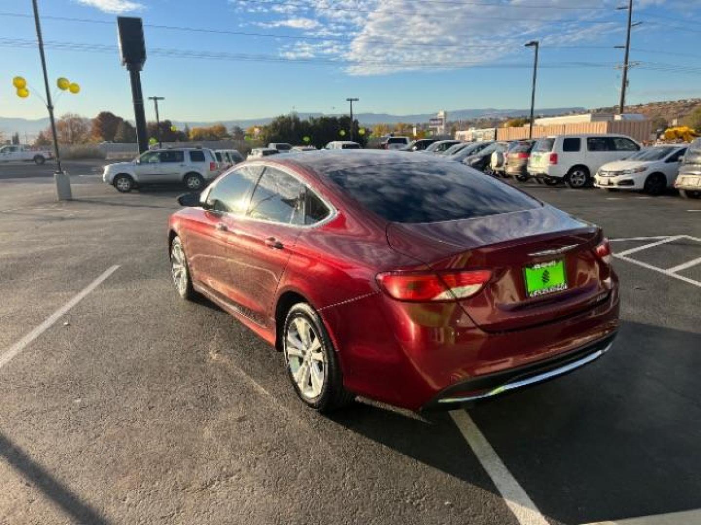 2016 Velvet Red Pearl Coa /Black, premium cloth Chrysler 200 Limited (1C3CCCAB9GN) with an 2.4L L4 DOHC 16V engine, 9-Speed Automatic transmission, located at 940 North Main Street, Cedar City, UT, 84720, (435) 628-0023, 37.692936, -113.061897 - We specialize in helping ALL people get the best financing available. No matter your credit score, good, bad or none we can get you an amazing rate. Had a bankruptcy, divorce, or repossessions? We give you the green light to get your credit back on the road. Low down and affordable payments that fit - Photo#4