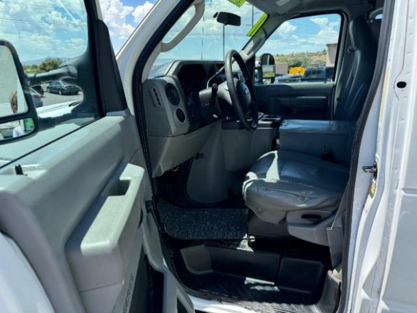 2011 Oxford White /Medium Flint Cloth I Ford Econoline E-250 (1FTNE2EL8BD) with an 5.4L V8 SOHC 16V engine, 4-Speed Automatic transmission, located at 1865 East Red Hills Pkwy, St. George, 84770, (435) 628-0023, 37.120850, -113.543640 - CNG Fuel . We specialize in helping ALL people get the best financing available. No matter your credit score, good, bad or none we can get you an amazing rate. Had a bankruptcy, divorce, or repossessions? We give you the green light to get your credit back on the road. Low down and affordable paymen - Photo#9