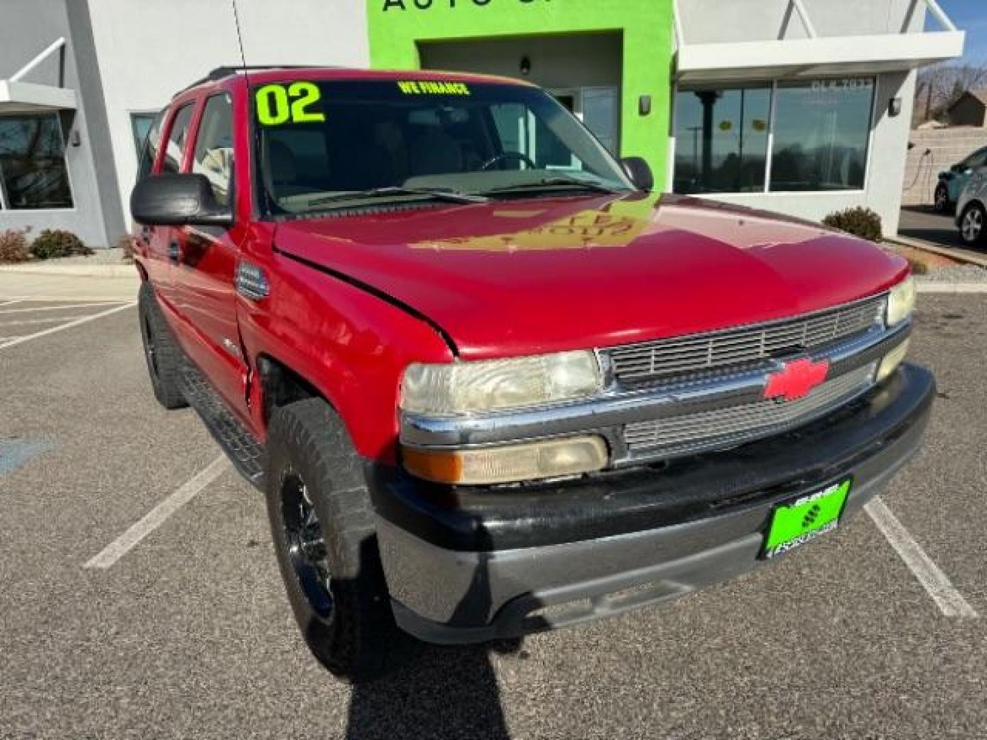 2002 Victory Red /Tan/Neutral Custom C Chevrolet Tahoe 2WD (1GNEC13VX2R) with an 4.8L V8 OHV 16V engine, 4-Speed Automatic transmission, located at 940 North Main Street, Cedar City, UT, 84720, (435) 628-0023, 37.692936, -113.061897 - Photo#1