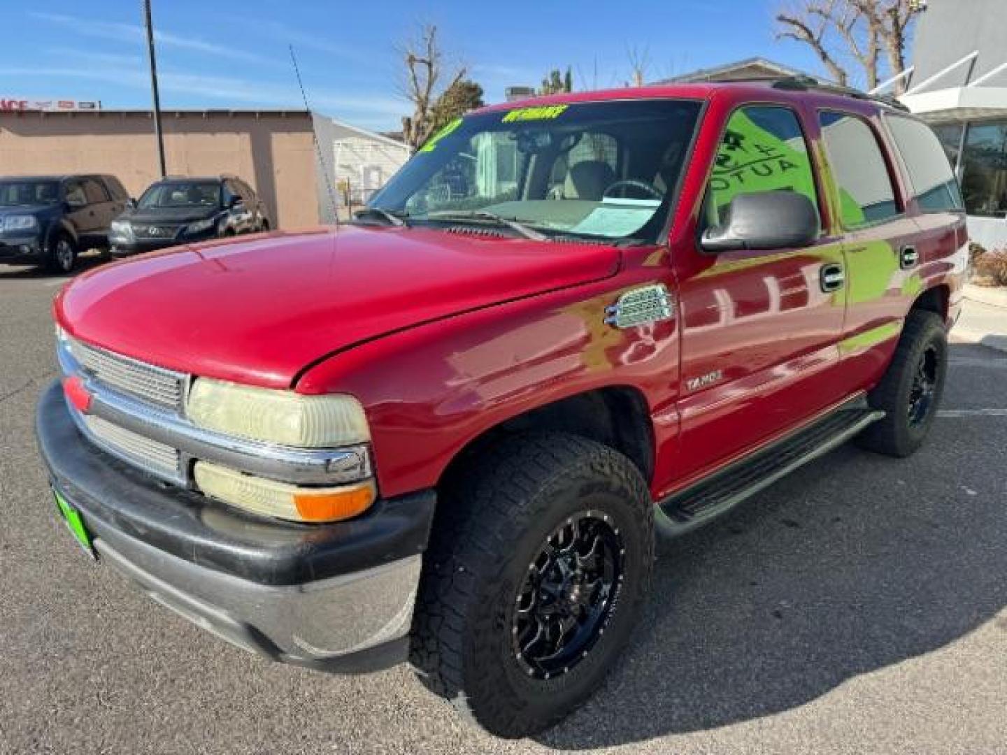 2002 Victory Red /Tan/Neutral Custom C Chevrolet Tahoe 2WD (1GNEC13VX2R) with an 4.8L V8 OHV 16V engine, 4-Speed Automatic transmission, located at 940 North Main Street, Cedar City, UT, 84720, (435) 628-0023, 37.692936, -113.061897 - Photo#4