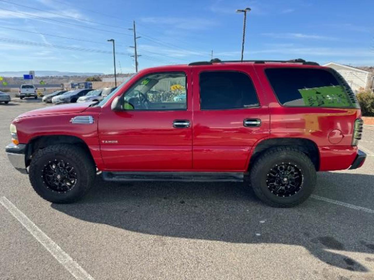 2002 Victory Red /Tan/Neutral Custom C Chevrolet Tahoe 2WD (1GNEC13VX2R) with an 4.8L V8 OHV 16V engine, 4-Speed Automatic transmission, located at 940 North Main Street, Cedar City, UT, 84720, (435) 628-0023, 37.692936, -113.061897 - Photo#5