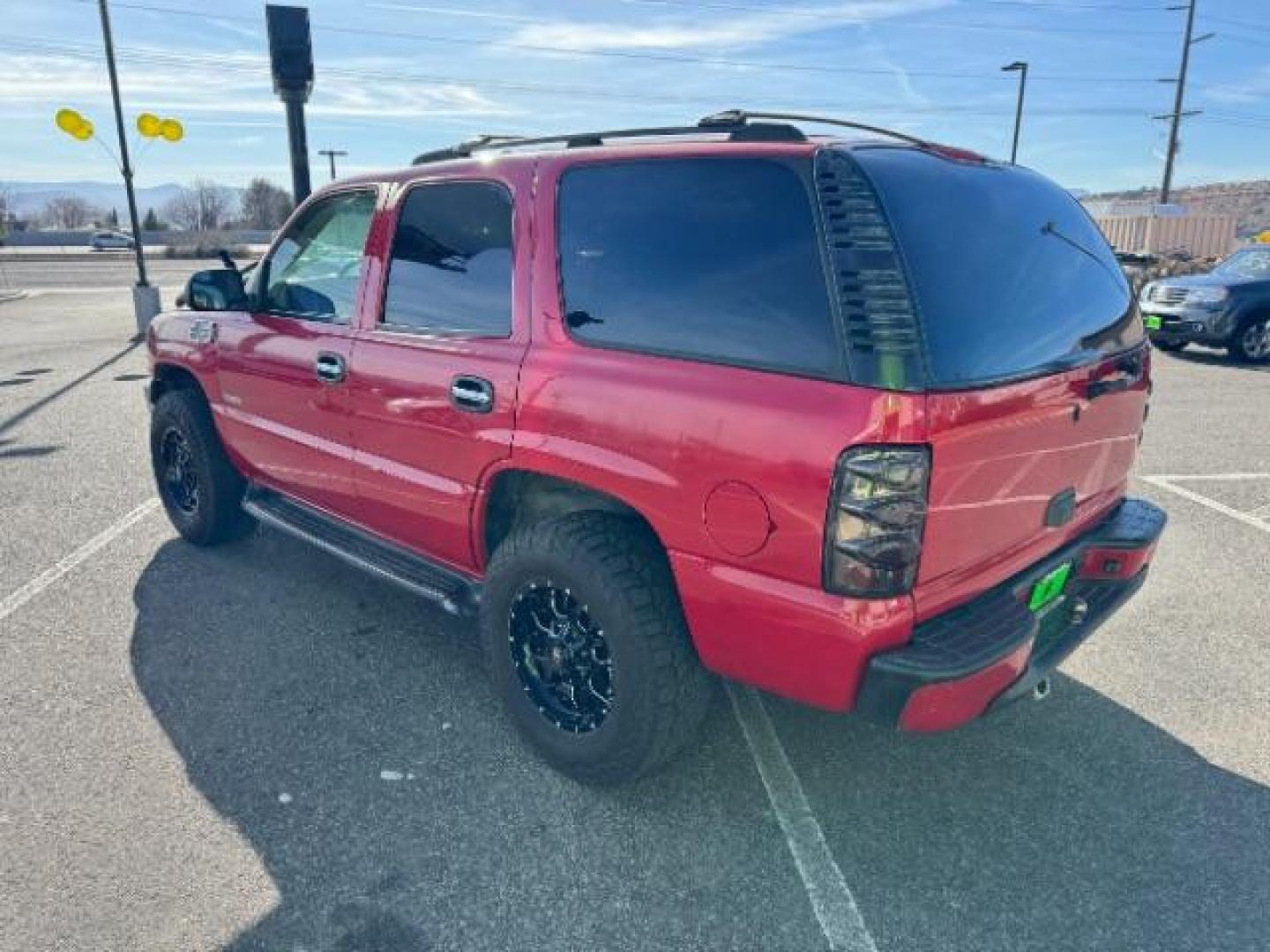 2002 Victory Red /Tan/Neutral Custom C Chevrolet Tahoe 2WD (1GNEC13VX2R) with an 4.8L V8 OHV 16V engine, 4-Speed Automatic transmission, located at 940 North Main Street, Cedar City, UT, 84720, (435) 628-0023, 37.692936, -113.061897 - Photo#6