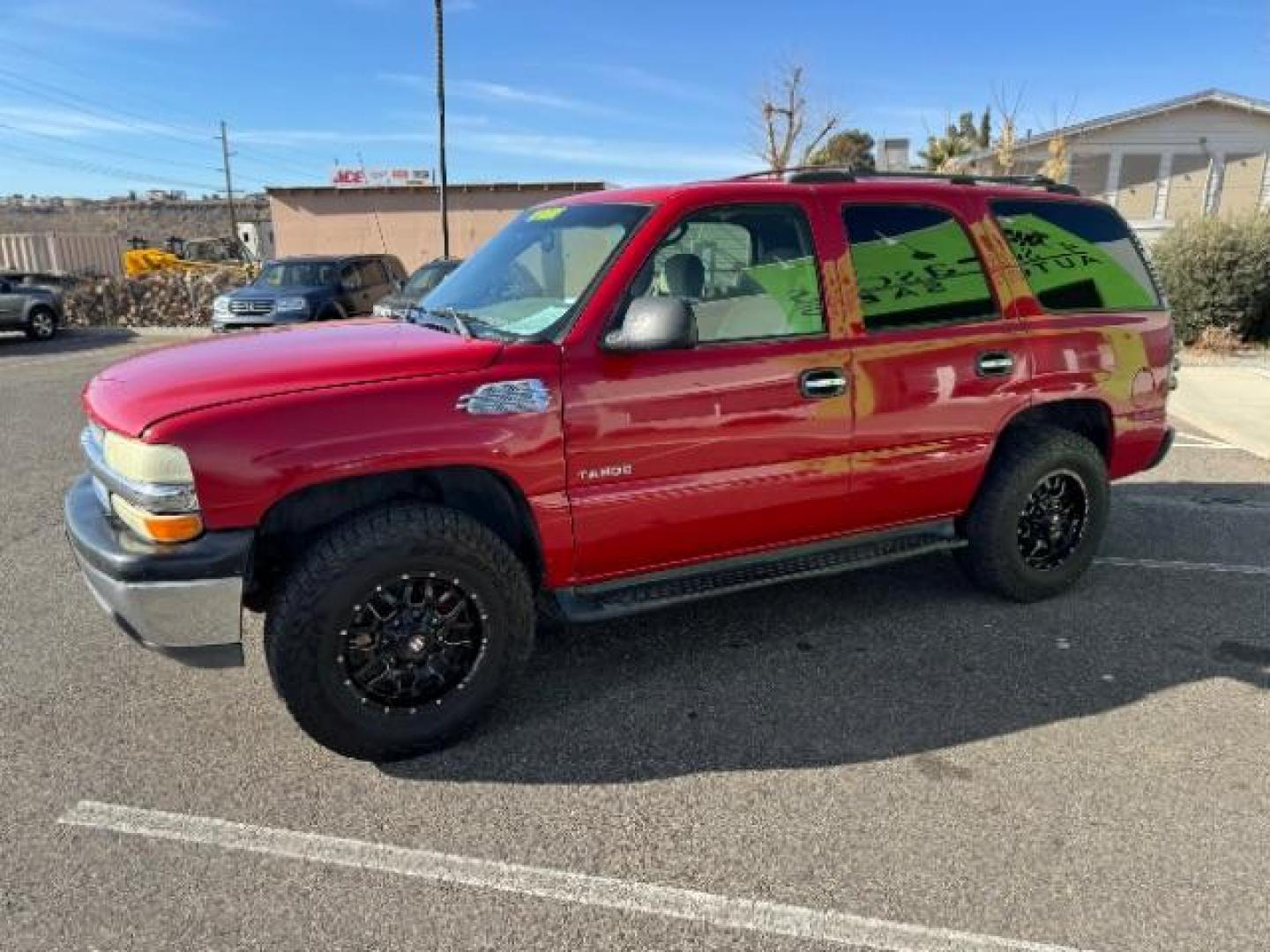 2002 Victory Red /Tan/Neutral Custom C Chevrolet Tahoe 2WD (1GNEC13VX2R) with an 4.8L V8 OHV 16V engine, 4-Speed Automatic transmission, located at 940 North Main Street, Cedar City, UT, 84720, (435) 628-0023, 37.692936, -113.061897 - Photo#3