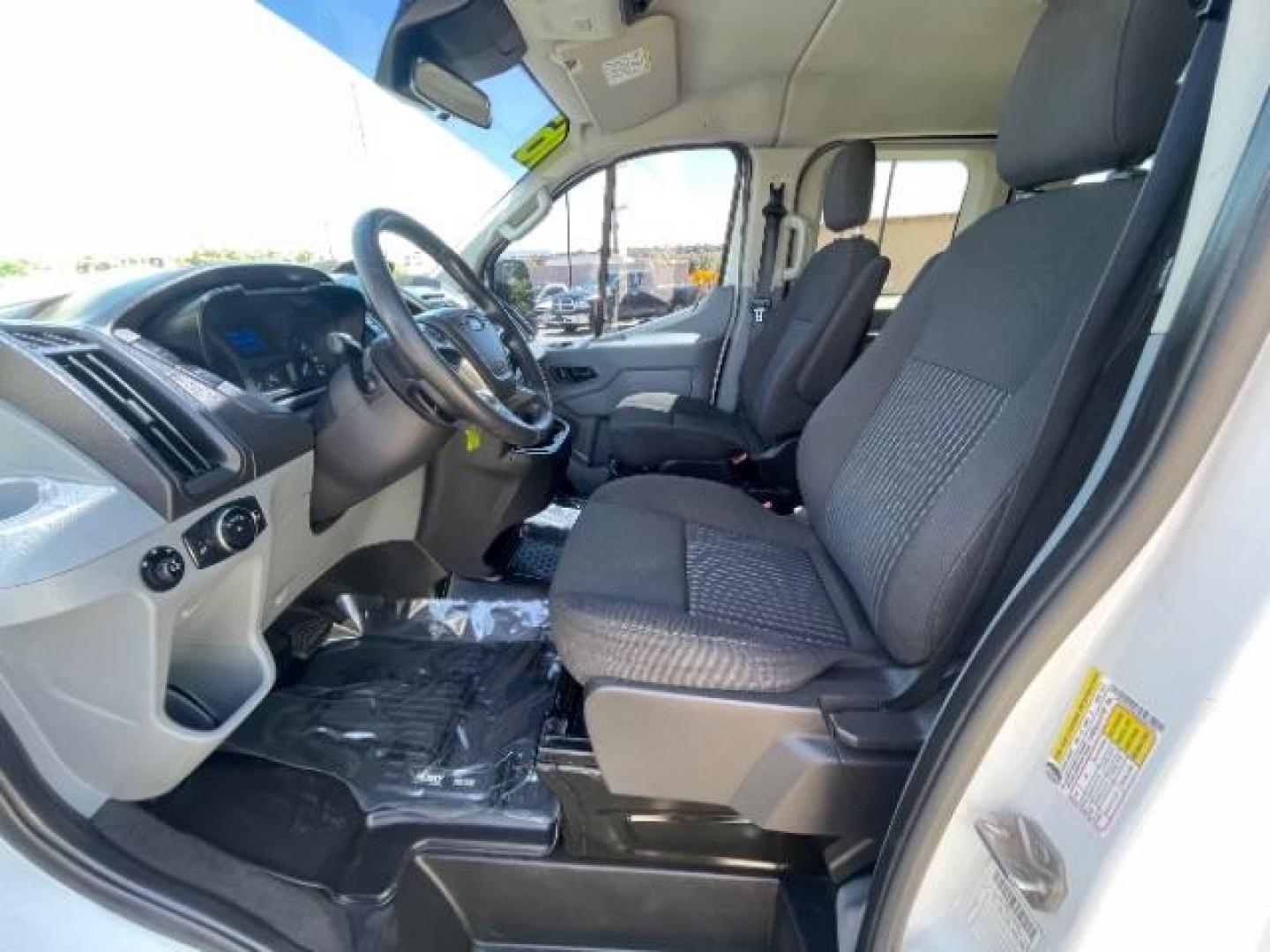 2016 White /Charcoal, cloth Ford Transit 350 Wagon Low Roof XLT 60/40 Pass. 148-in. WB (1FBZX2ZM9GK) with an 3.7L V6 DOHC 24V engine, 6-Speed Automatic transmission, located at 1865 East Red Hills Pkwy, St. George, 84770, (435) 628-0023, 37.120850, -113.543640 - We specialize in helping ALL people get the best financing available. No matter your credit score, good, bad or none we can get you an amazing rate. Had a bankruptcy, divorce, or repossessions? We give you the green light to get your credit back on the road. Low down and affordable payments that fit - Photo#13