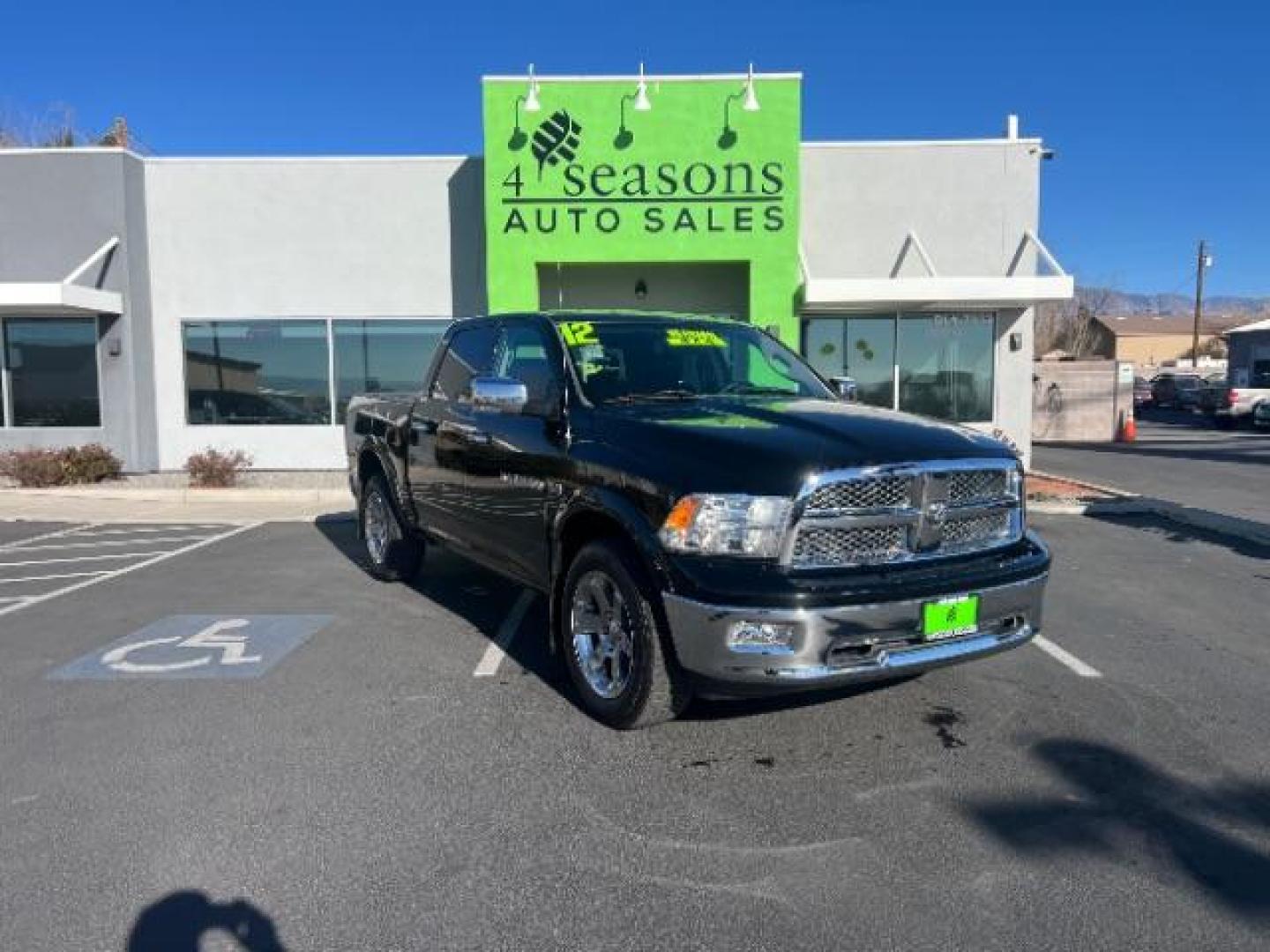 2012 Black /Dark Slate Leather Interior RAM 1500 Laramie Crew Cab 4WD (1C6RD7NT5CS) with an 5.7L V8 OHV 16V engine, 6-Speed Automatic transmission, located at 940 North Main Street, Cedar City, UT, 84720, (435) 628-0023, 37.692936, -113.061897 - We specialize in helping ALL people get the best financing available. No matter your credit score, good, bad or none we can get you an amazing rate. Had a bankruptcy, divorce, or repossessions? We give you the green light to get your credit back on the road. Low down and affordable payments that fit - Photo#0