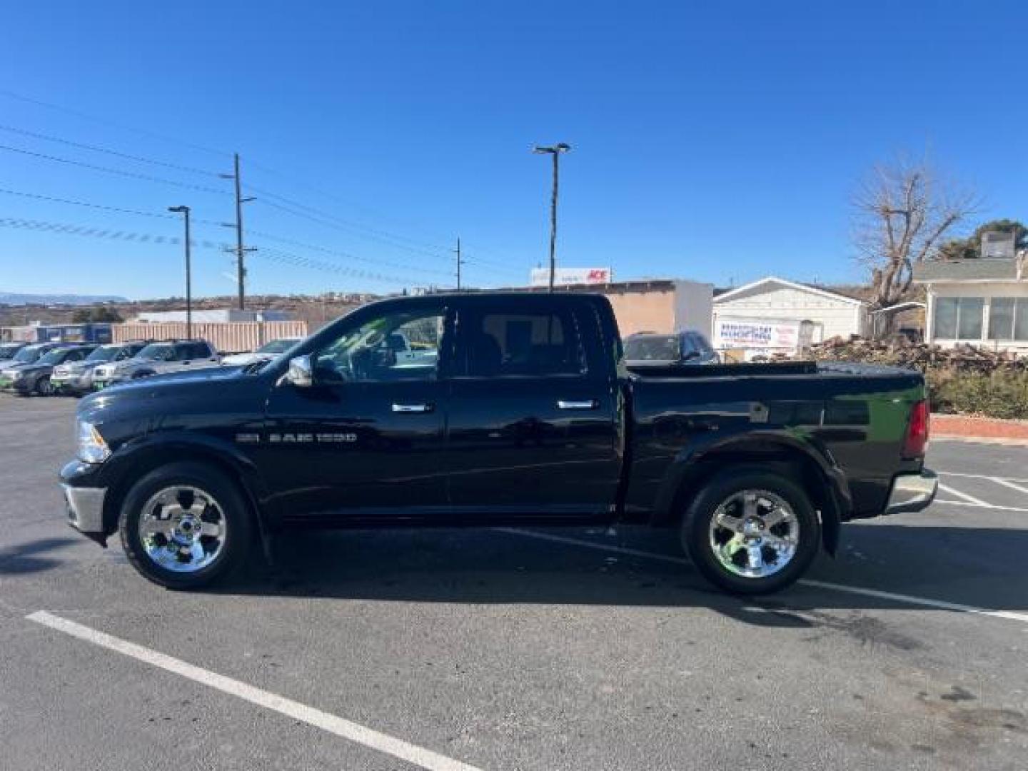 2012 Black /Dark Slate Leather Interior RAM 1500 Laramie Crew Cab 4WD (1C6RD7NT5CS) with an 5.7L V8 OHV 16V engine, 6-Speed Automatic transmission, located at 940 North Main Street, Cedar City, UT, 84720, (435) 628-0023, 37.692936, -113.061897 - We specialize in helping ALL people get the best financing available. No matter your credit score, good, bad or none we can get you an amazing rate. Had a bankruptcy, divorce, or repossessions? We give you the green light to get your credit back on the road. Low down and affordable payments that fit - Photo#3