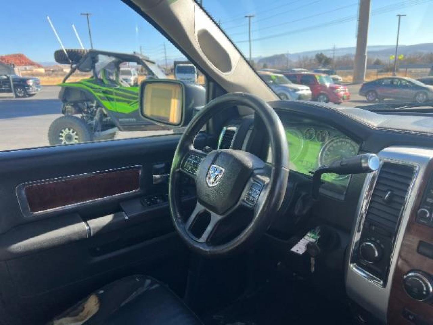 2012 Black /Dark Slate Leather Interior RAM 1500 Laramie Crew Cab 4WD (1C6RD7NT5CS) with an 5.7L V8 OHV 16V engine, 6-Speed Automatic transmission, located at 940 North Main Street, Cedar City, UT, 84720, (435) 628-0023, 37.692936, -113.061897 - We specialize in helping ALL people get the best financing available. No matter your credit score, good, bad or none we can get you an amazing rate. Had a bankruptcy, divorce, or repossessions? We give you the green light to get your credit back on the road. Low down and affordable payments that fit - Photo#30