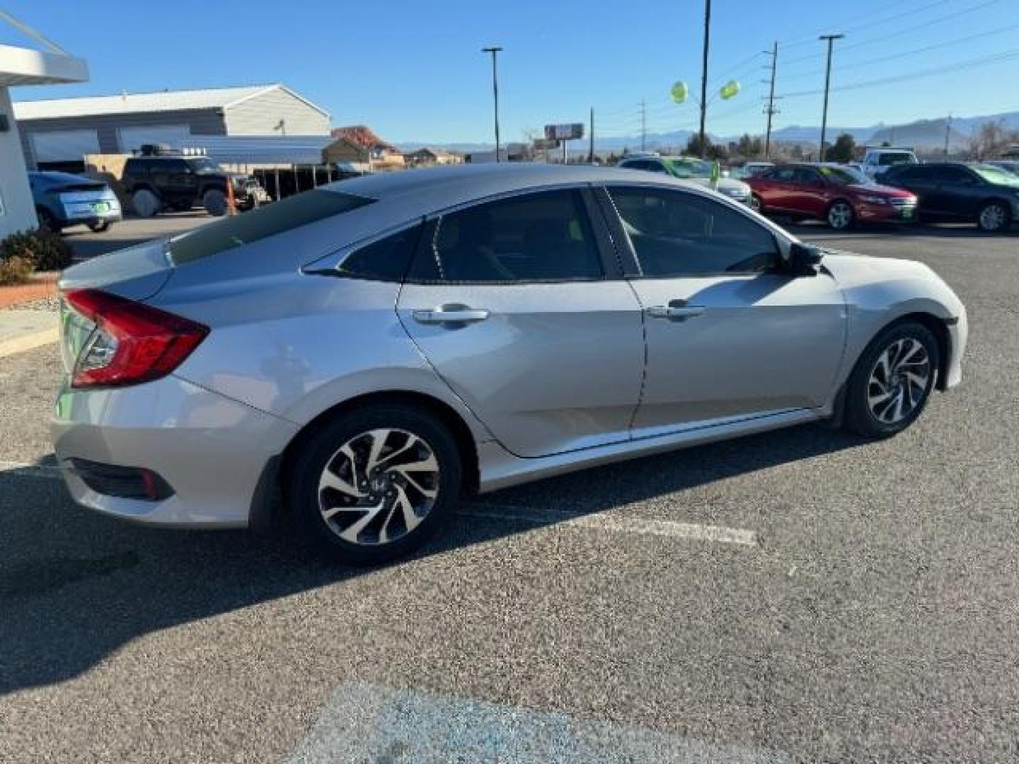 2016 Lunar Silver Metalli /Black, cloth Honda Civic EX Sedan CVT (2HGFC2F78GH) with an 2.0L L4 DOHC 16V engine, Continuously Variabl transmission, located at 1865 East Red Hills Pkwy, St. George, 84770, (435) 628-0023, 37.120850, -113.543640 - Photo#10