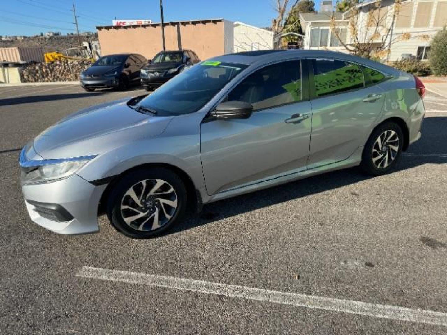 2016 Lunar Silver Metalli /Black, cloth Honda Civic EX Sedan CVT (2HGFC2F78GH) with an 2.0L L4 DOHC 16V engine, Continuously Variabl transmission, located at 1865 East Red Hills Pkwy, St. George, 84770, (435) 628-0023, 37.120850, -113.543640 - Photo#4