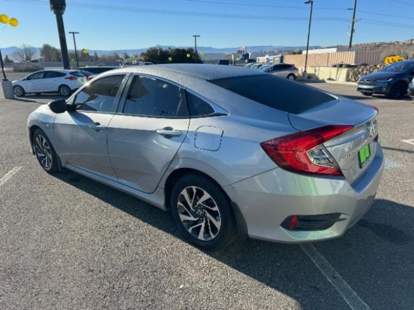 2016 Lunar Silver Metalli /Black, cloth Honda Civic EX Sedan CVT (2HGFC2F78GH) with an 2.0L L4 DOHC 16V engine, Continuously Variabl transmission, located at 1865 East Red Hills Pkwy, St. George, 84770, (435) 628-0023, 37.120850, -113.543640 - Photo#6