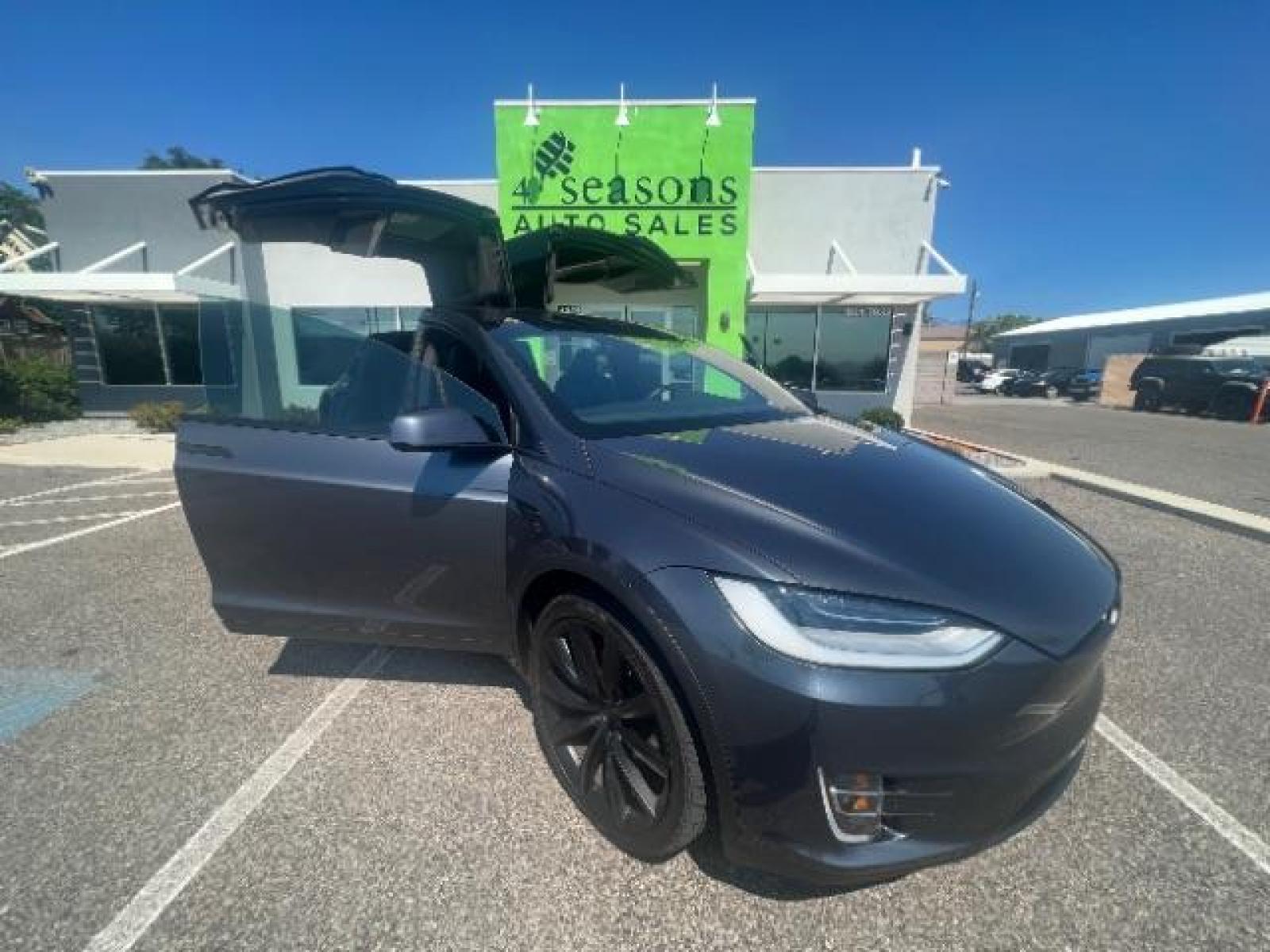 2020 Midnight Silver Metallic /All Black, leatherette Tesla Model X Performance (5YJXCBE45LF) with an ELECTRIC engine, 1-Speed Automatic transmission, located at 1865 East Red Hills Pkwy, St. George, 84770, (435) 628-0023, 37.120850, -113.543640 - 6 Seats, Ludicrous mode, 0-60mph in under 3 seconds, CLEAN TITLE, 1 Owner, Tow hitch, CCS adapter installed, Homelink, Low Miles, Great condition, New tires, Full self driving capable computer. Bumper 2 bumper warranty until Feb-2024, Motor and Battery warranty until Feb-2028. Call or text for m - Photo #1