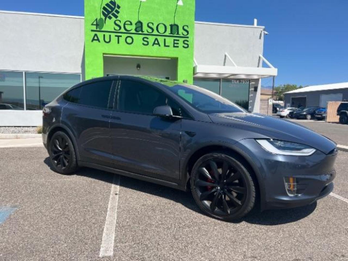 2020 Midnight Silver Metallic /All Black, leatherette Tesla Model X Performance (5YJXCBE45LF) with an ELECTRIC engine, 1-Speed Automatic transmission, located at 1865 East Red Hills Pkwy, St. George, 84770, (435) 628-0023, 37.120850, -113.543640 - SOLD - But we can find you any Tesla at wholesale prices from our large network of used Teslas. Call us to talk availability and prices. 6 Seats, Ludicrous mode, 0-60mph in under 3 seconds, CLEAN TITLE, 1 Owner, Tow hitch, CCS adapter installed, Homelink, Low Miles, Great condition, New tires, - Photo#0