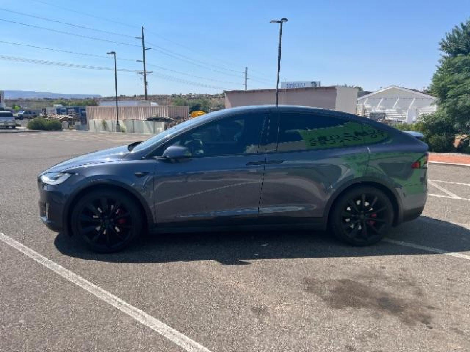 2020 Midnight Silver Metallic /All Black, leatherette Tesla Model X Performance (5YJXCBE45LF) with an ELECTRIC engine, 1-Speed Automatic transmission, located at 1865 East Red Hills Pkwy, St. George, 84770, (435) 628-0023, 37.120850, -113.543640 - 6 Seats, Ludicrous mode, 0-60mph in under 3 seconds, CLEAN TITLE, 1 Owner, Tow hitch, CCS adapter installed, Homelink, Low Miles, Great condition, New tires, Full self driving capable computer. Bumper 2 bumper warranty until Feb-2024, Motor and Battery warranty until Feb-2028. Call or text for m - Photo #5