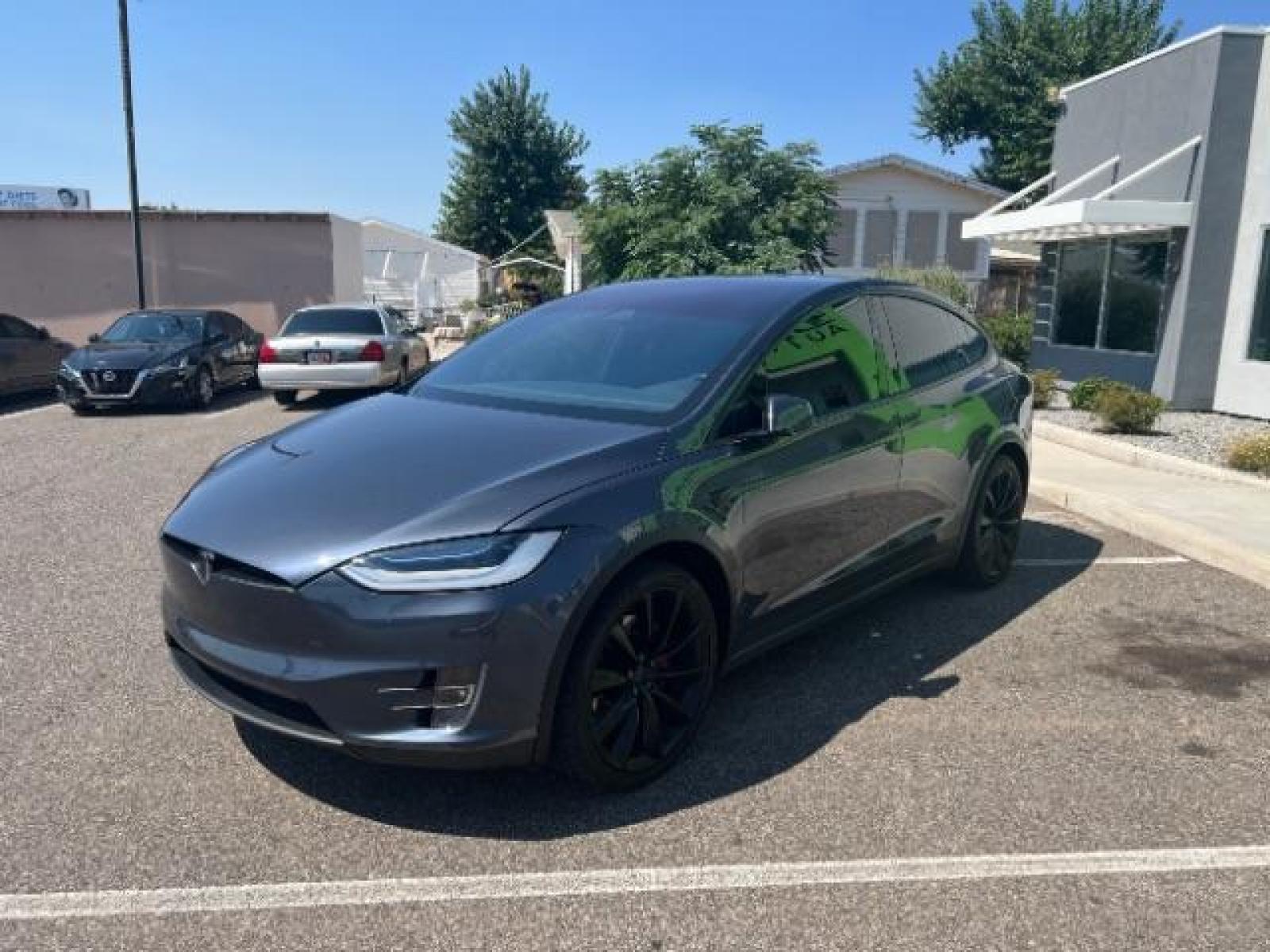 2020 Midnight Silver Metallic /All Black, leatherette Tesla Model X Performance (5YJXCBE45LF) with an ELECTRIC engine, 1-Speed Automatic transmission, located at 1865 East Red Hills Pkwy, St. George, 84770, (435) 628-0023, 37.120850, -113.543640 - 6 Seats, Ludicrous mode, 0-60mph in under 3 seconds, CLEAN TITLE, 1 Owner, Tow hitch, CCS adapter installed, Homelink, Low Miles, Great condition, New tires, Full self driving capable computer. Bumper 2 bumper warranty until Feb-2024, Motor and Battery warranty until Feb-2028. Call or text for m - Photo #4