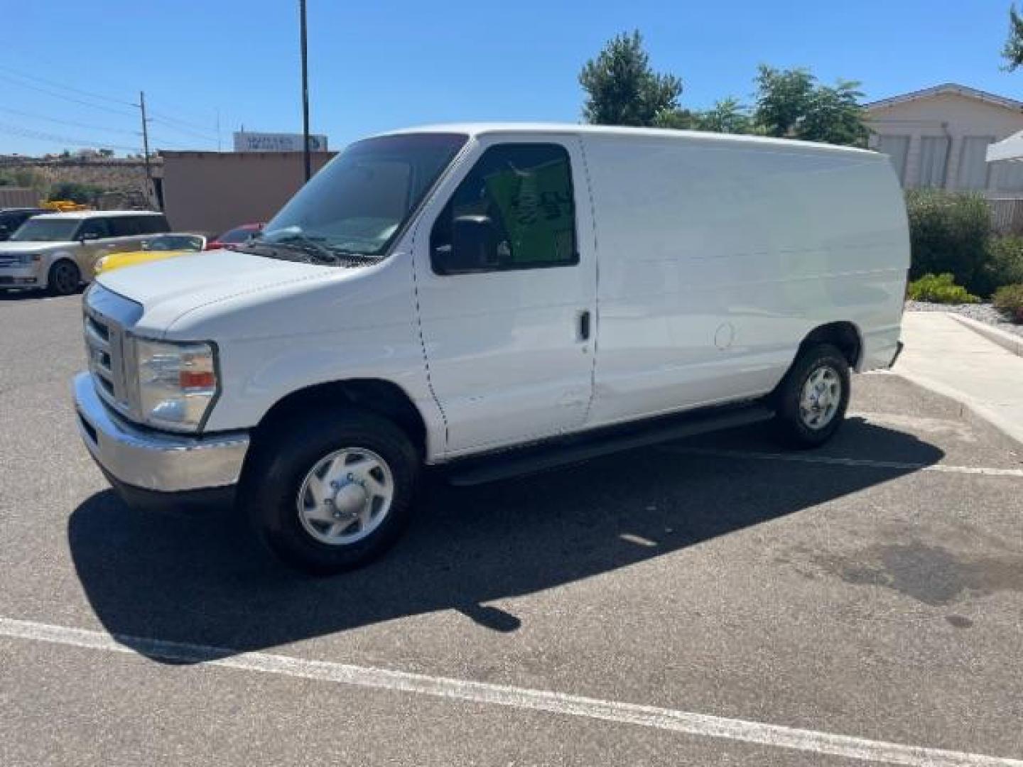 2009 Oxford White /Medium Flint Cloth Interior Ford Econoline E-250 (1FTNE24W19D) with an 4.6L V8 SOHC 16V engine, 4-Speed Automatic transmission, located at 1865 East Red Hills Pkwy, St. George, 84770, (435) 628-0023, 37.120850, -113.543640 - Photo#4