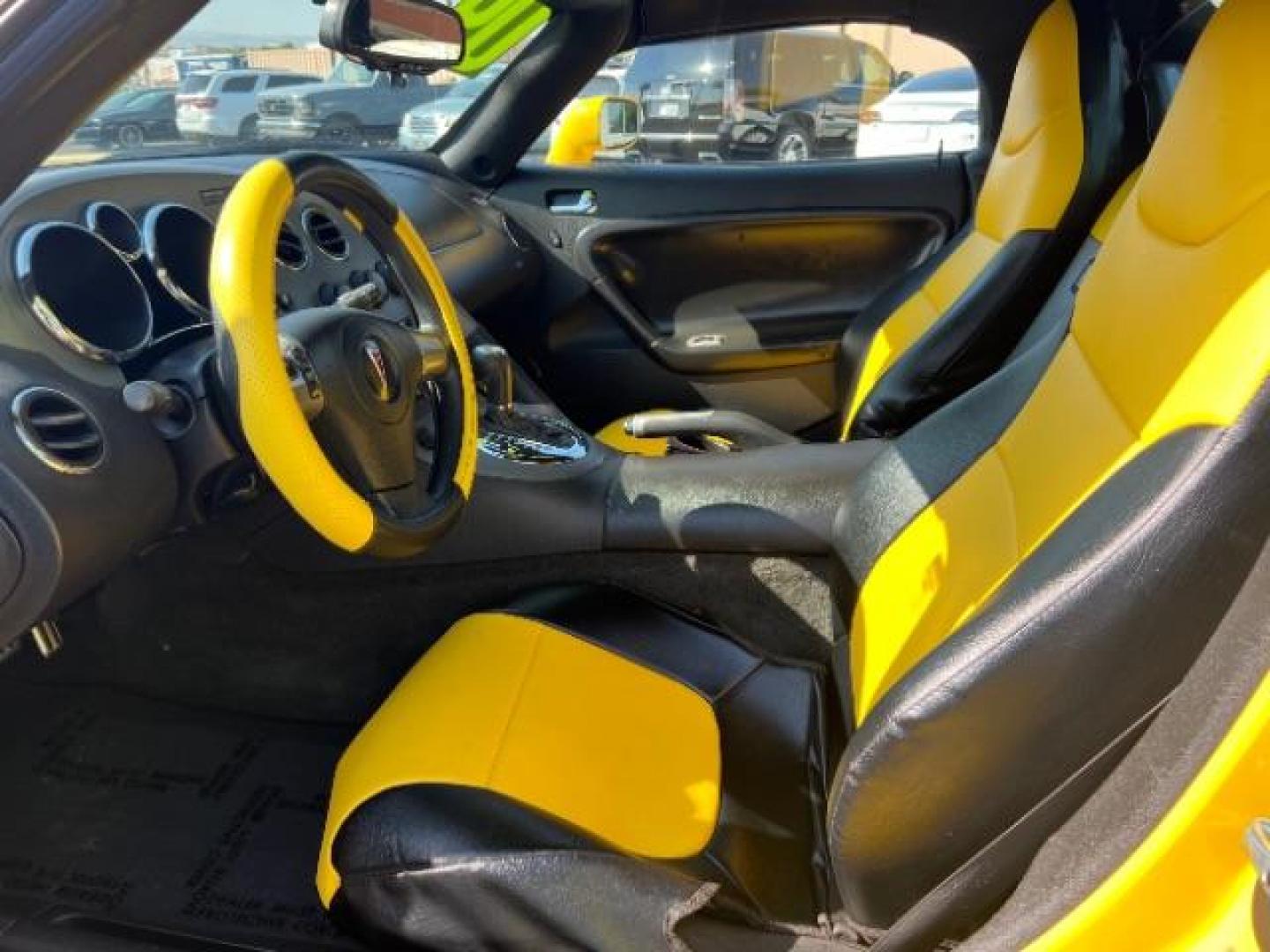 2009 Yellow /Ebony Leather Interior Pontiac Solstice Base (1G2MN35B69Y) with an 2.4L L4 DOHC 16V engine, 5-Speed Automatic transmission, located at 1865 East Red Hills Pkwy, St. George, 84770, (435) 628-0023, 37.120850, -113.543640 - Photo#13