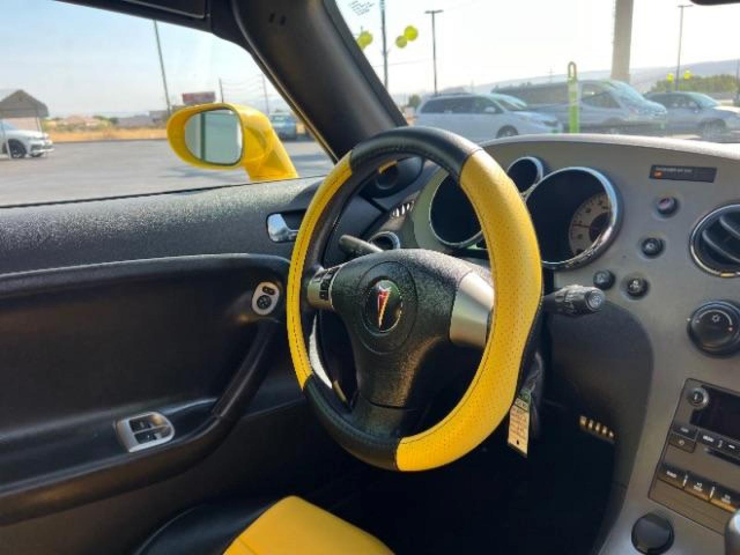 2009 Yellow /Ebony Leather Interior Pontiac Solstice Base (1G2MN35B69Y) with an 2.4L L4 DOHC 16V engine, 5-Speed Automatic transmission, located at 1865 East Red Hills Pkwy, St. George, 84770, (435) 628-0023, 37.120850, -113.543640 - Photo#28