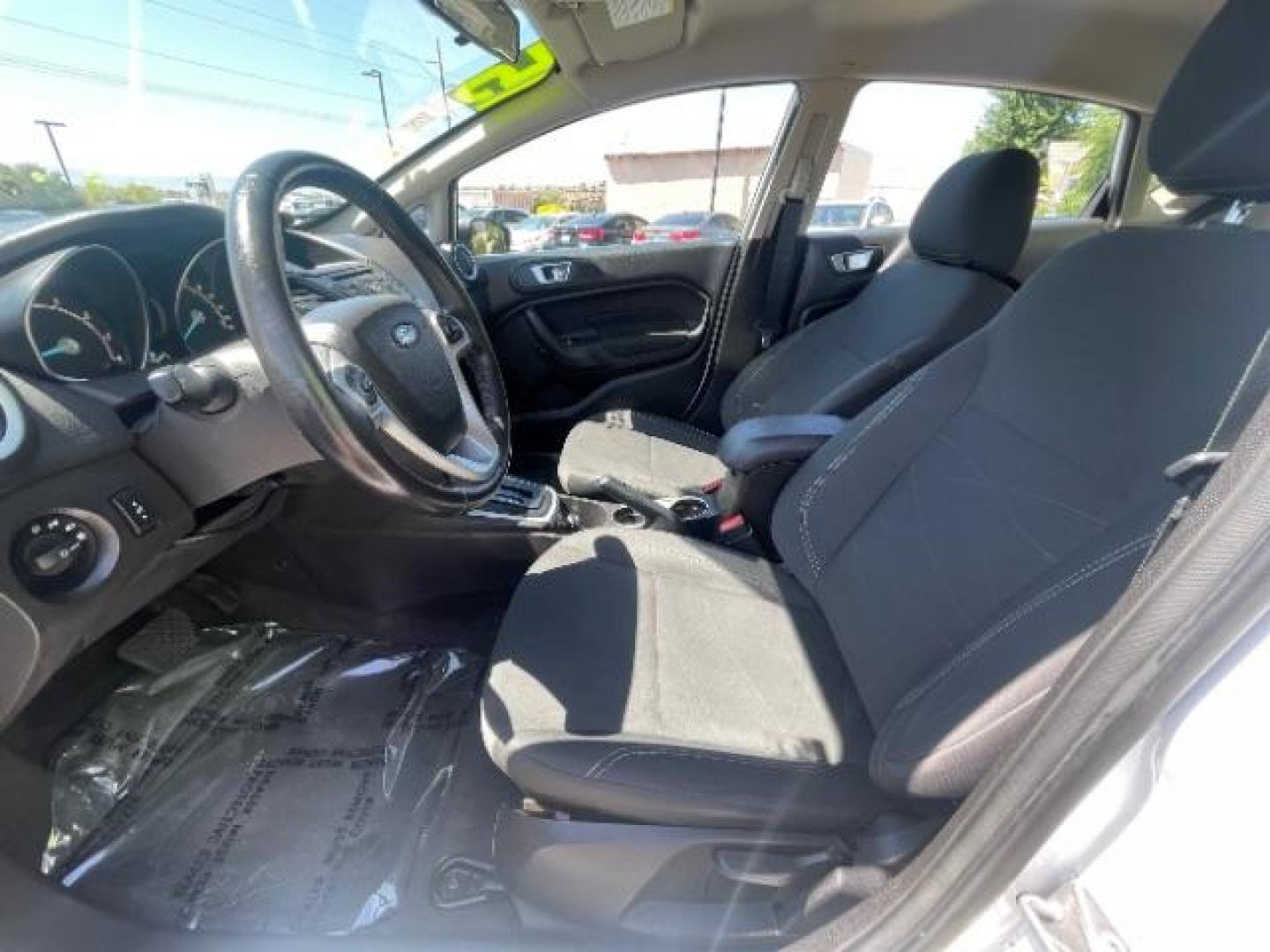 2015 Oxford White /Charcoal Black Ford Fiesta SE Hatchback (3FADP4EJ4FM) with an 1.6L L4 DOHC 16V engine, 6-Speed Automatic transmission, located at 1865 East Red Hills Pkwy, St. George, 84770, (435) 628-0023, 37.120850, -113.543640 - We specialize in helping ALL people get the best financing available. No matter your credit score, good, bad or none we can get you an amazing rate. Had a bankruptcy, divorce, or repossessions? We give you the green light to get your credit back on the road. Low down and affordable payments that fit - Photo#12