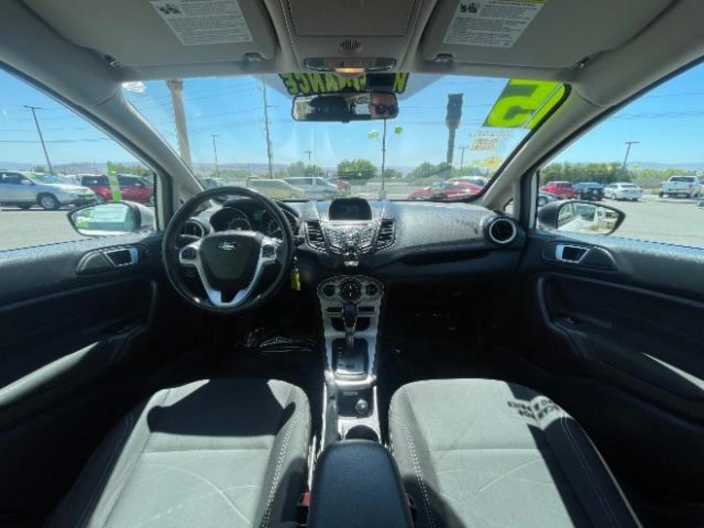 2015 Oxford White /Charcoal Black Ford Fiesta SE Hatchback (3FADP4EJ4FM) with an 1.6L L4 DOHC 16V engine, 6-Speed Automatic transmission, located at 1865 East Red Hills Pkwy, St. George, 84770, (435) 628-0023, 37.120850, -113.543640 - We specialize in helping ALL people get the best financing available. No matter your credit score, good, bad or none we can get you an amazing rate. Had a bankruptcy, divorce, or repossessions? We give you the green light to get your credit back on the road. Low down and affordable payments that fit - Photo#21