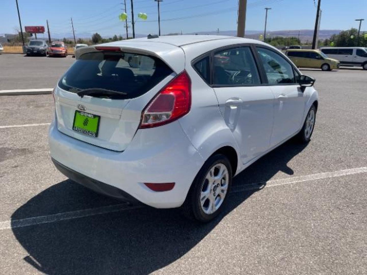 2015 Oxford White /Charcoal Black Ford Fiesta SE Hatchback (3FADP4EJ4FM) with an 1.6L L4 DOHC 16V engine, 6-Speed Automatic transmission, located at 1865 East Red Hills Pkwy, St. George, 84770, (435) 628-0023, 37.120850, -113.543640 - We specialize in helping ALL people get the best financing available. No matter your credit score, good, bad or none we can get you an amazing rate. Had a bankruptcy, divorce, or repossessions? We give you the green light to get your credit back on the road. Low down and affordable payments that fit - Photo#9