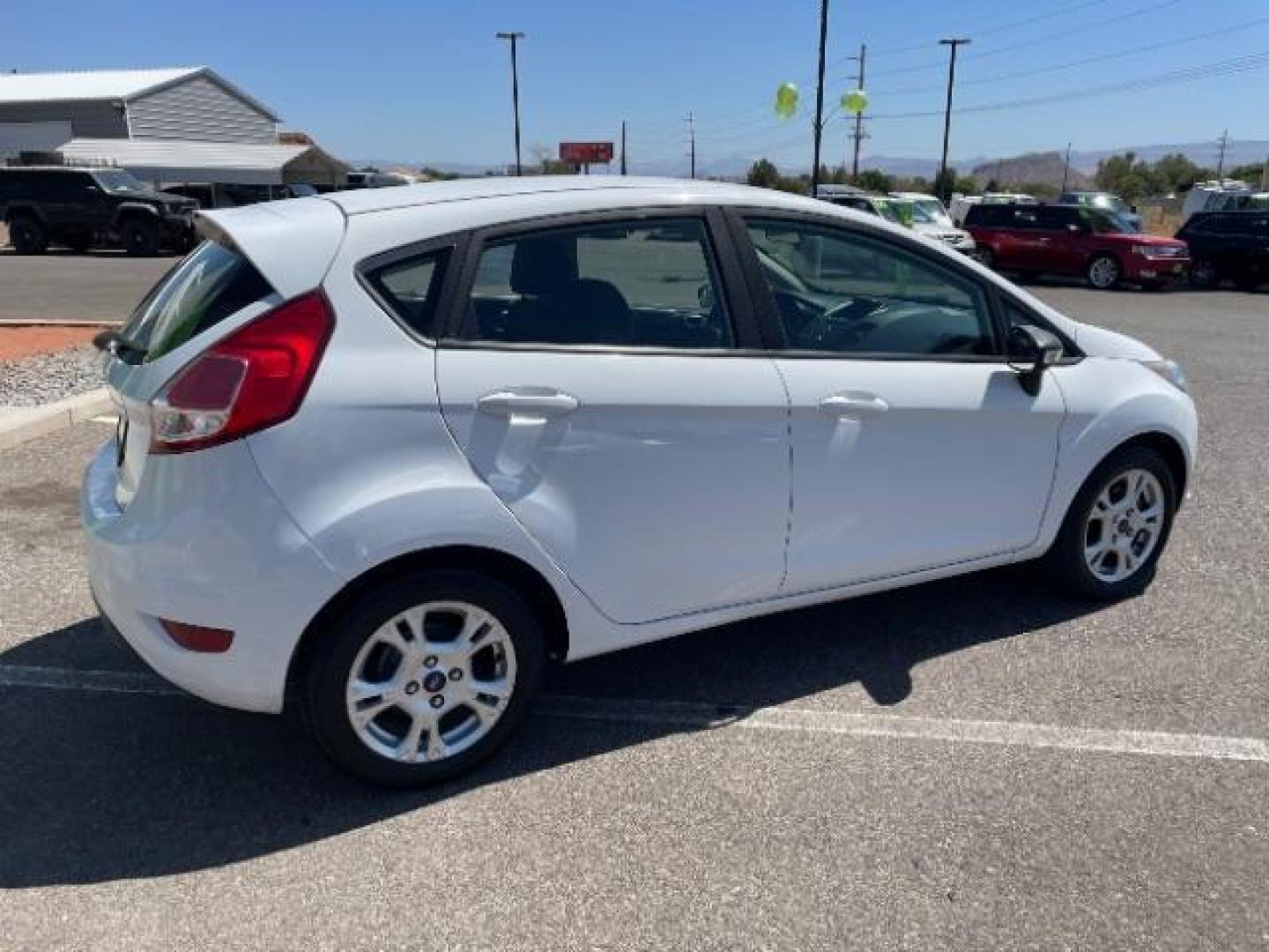 2015 Oxford White /Charcoal Black Ford Fiesta SE Hatchback (3FADP4EJ4FM) with an 1.6L L4 DOHC 16V engine, 6-Speed Automatic transmission, located at 1865 East Red Hills Pkwy, St. George, 84770, (435) 628-0023, 37.120850, -113.543640 - Photo#10