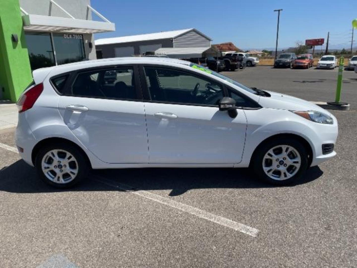 2015 Oxford White /Charcoal Black Ford Fiesta SE Hatchback (3FADP4EJ4FM) with an 1.6L L4 DOHC 16V engine, 6-Speed Automatic transmission, located at 1865 East Red Hills Pkwy, St. George, 84770, (435) 628-0023, 37.120850, -113.543640 - We specialize in helping ALL people get the best financing available. No matter your credit score, good, bad or none we can get you an amazing rate. Had a bankruptcy, divorce, or repossessions? We give you the green light to get your credit back on the road. Low down and affordable payments that fit - Photo#11