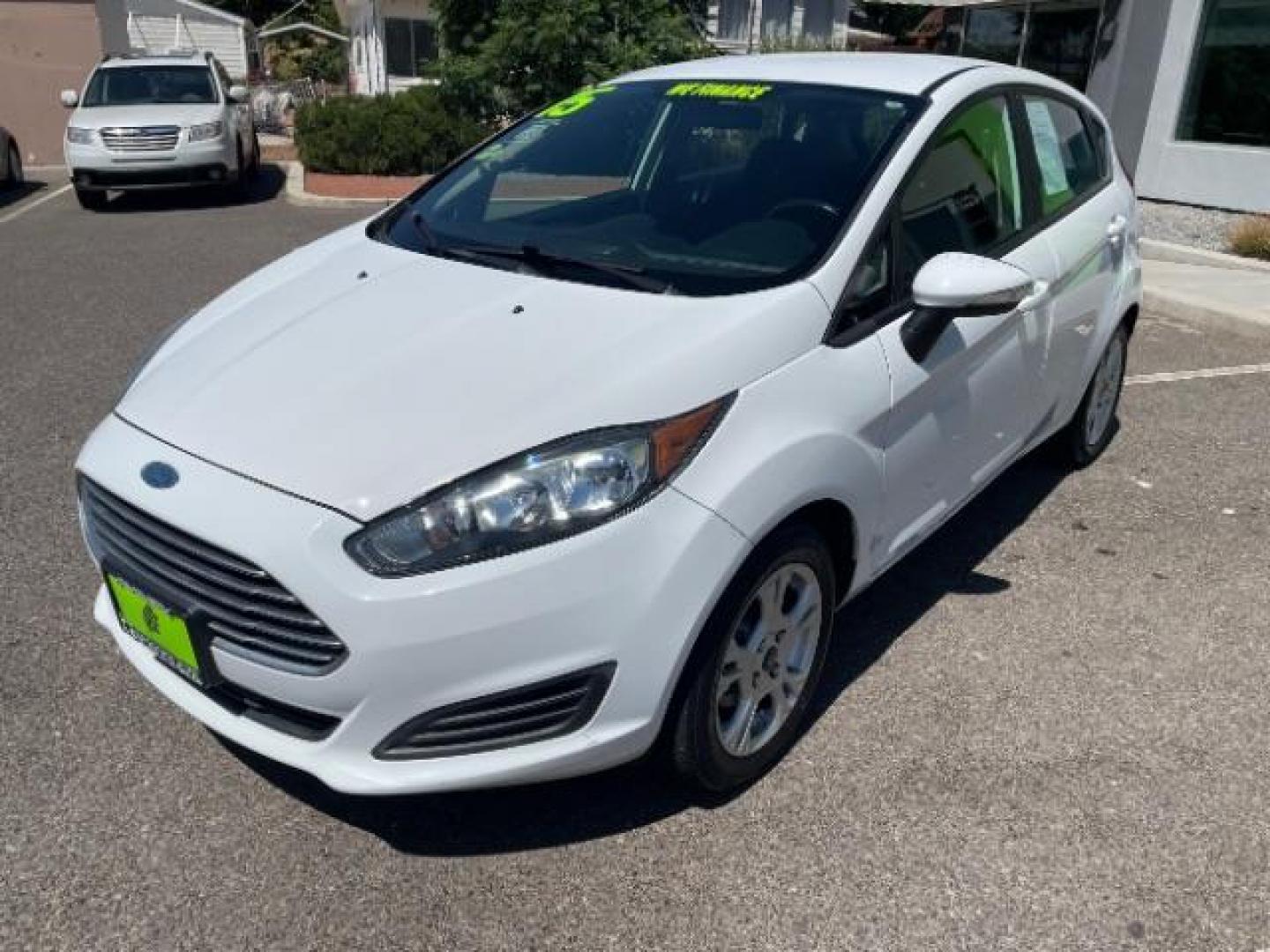 2015 Oxford White /Charcoal Black Ford Fiesta SE Hatchback (3FADP4EJ4FM) with an 1.6L L4 DOHC 16V engine, 6-Speed Automatic transmission, located at 1865 East Red Hills Pkwy, St. George, 84770, (435) 628-0023, 37.120850, -113.543640 - Photo#3