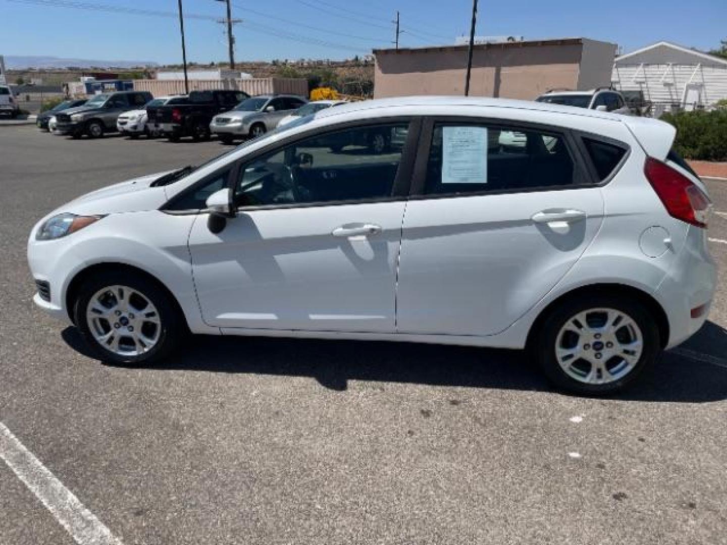 2015 Oxford White /Charcoal Black Ford Fiesta SE Hatchback (3FADP4EJ4FM) with an 1.6L L4 DOHC 16V engine, 6-Speed Automatic transmission, located at 1865 East Red Hills Pkwy, St. George, 84770, (435) 628-0023, 37.120850, -113.543640 - We specialize in helping ALL people get the best financing available. No matter your credit score, good, bad or none we can get you an amazing rate. Had a bankruptcy, divorce, or repossessions? We give you the green light to get your credit back on the road. Low down and affordable payments that fit - Photo#5