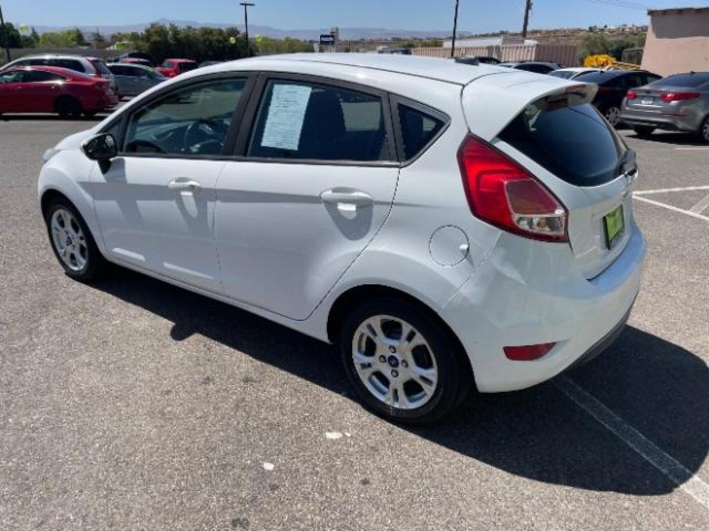 2015 Oxford White /Charcoal Black Ford Fiesta SE Hatchback (3FADP4EJ4FM) with an 1.6L L4 DOHC 16V engine, 6-Speed Automatic transmission, located at 1865 East Red Hills Pkwy, St. George, 84770, (435) 628-0023, 37.120850, -113.543640 - Photo#6