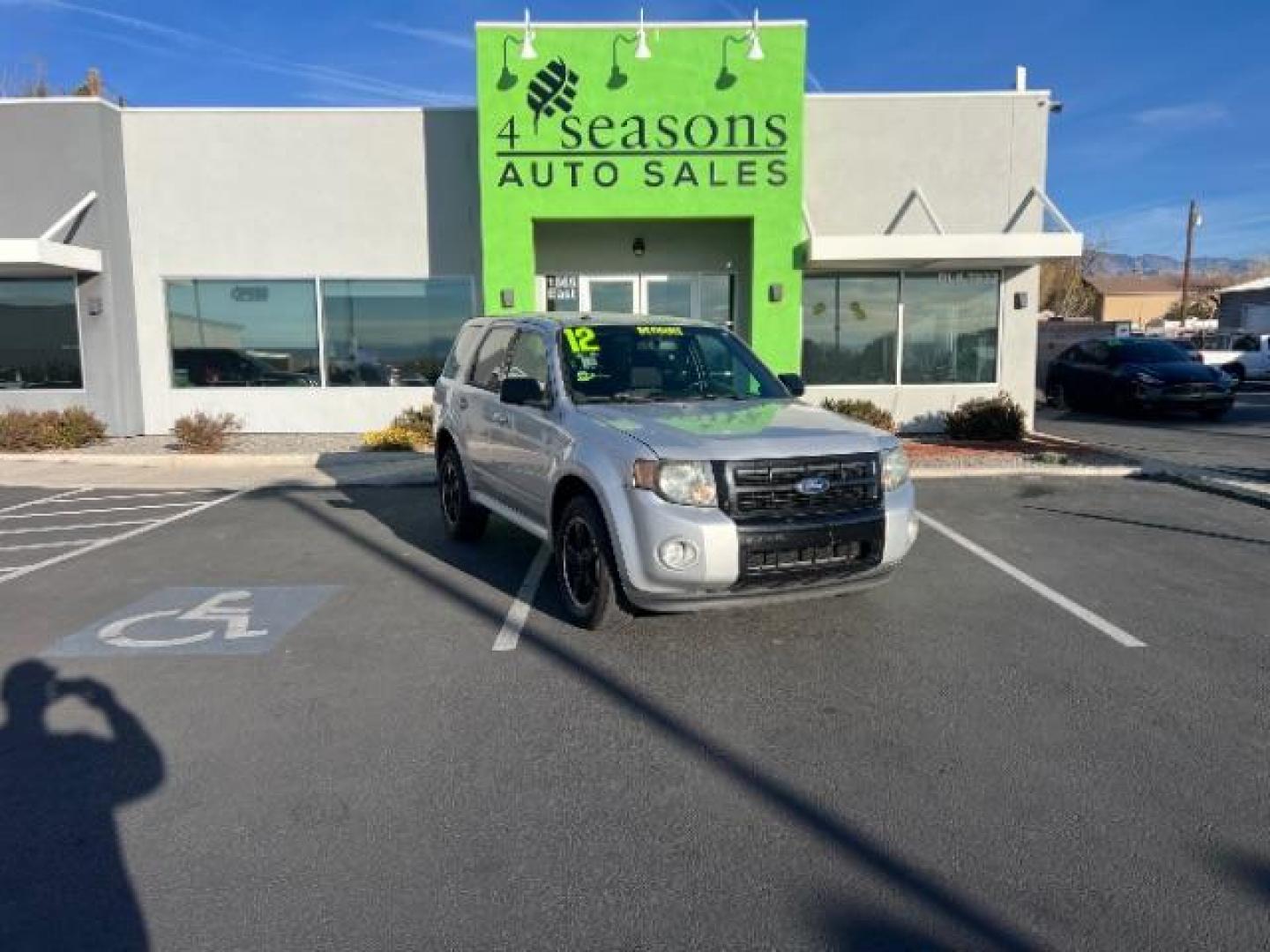 2012 Ingot Silver Metalli /Charcoal Black Cloth Ford Escape XLT FWD (1FMCU0DG9CK) with an 3.0L V6 DOHC 24V engine, 6-Speed Automatic transmission, located at 1865 East Red Hills Pkwy, St. George, 84770, (435) 628-0023, 37.120850, -113.543640 - We specialize in helping ALL people get the best financing available. No matter your credit score, good, bad or none we can get you an amazing rate. Had a bankruptcy, divorce, or repossessions? We give you the green light to get your credit back on the road. Low down and affordable payments that fit - Photo#0