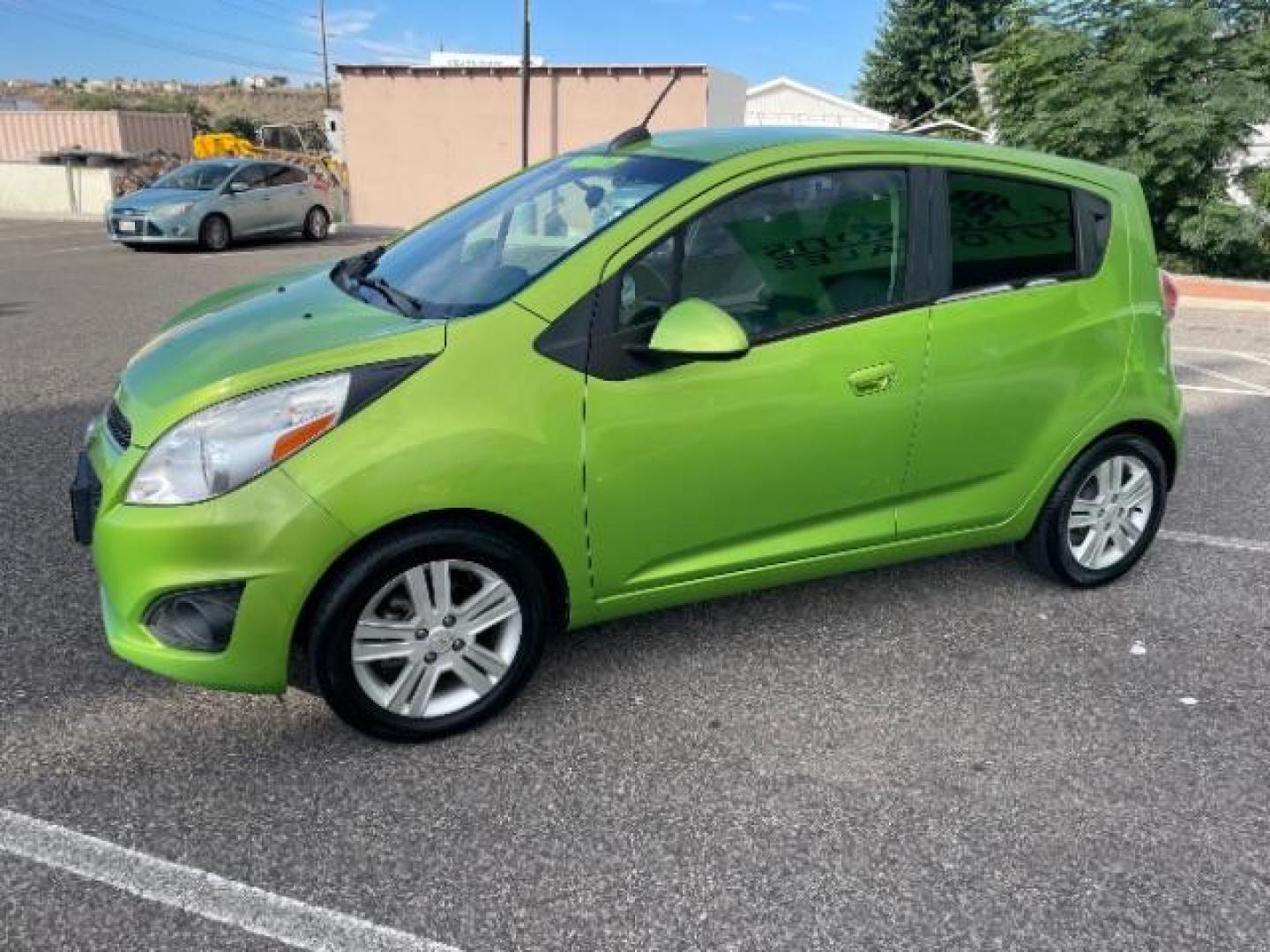 2015 Lime Metallic /Silver w/Silver Trim Chevrolet Spark LS Manual (KL8CA6S91FC) with an 1.2L L4 16V DOHC engine, 5-Speed Manual transmission, located at 940 North Main Street, Cedar City, UT, 84720, (435) 628-0023, 37.692936, -113.061897 - Photo#4