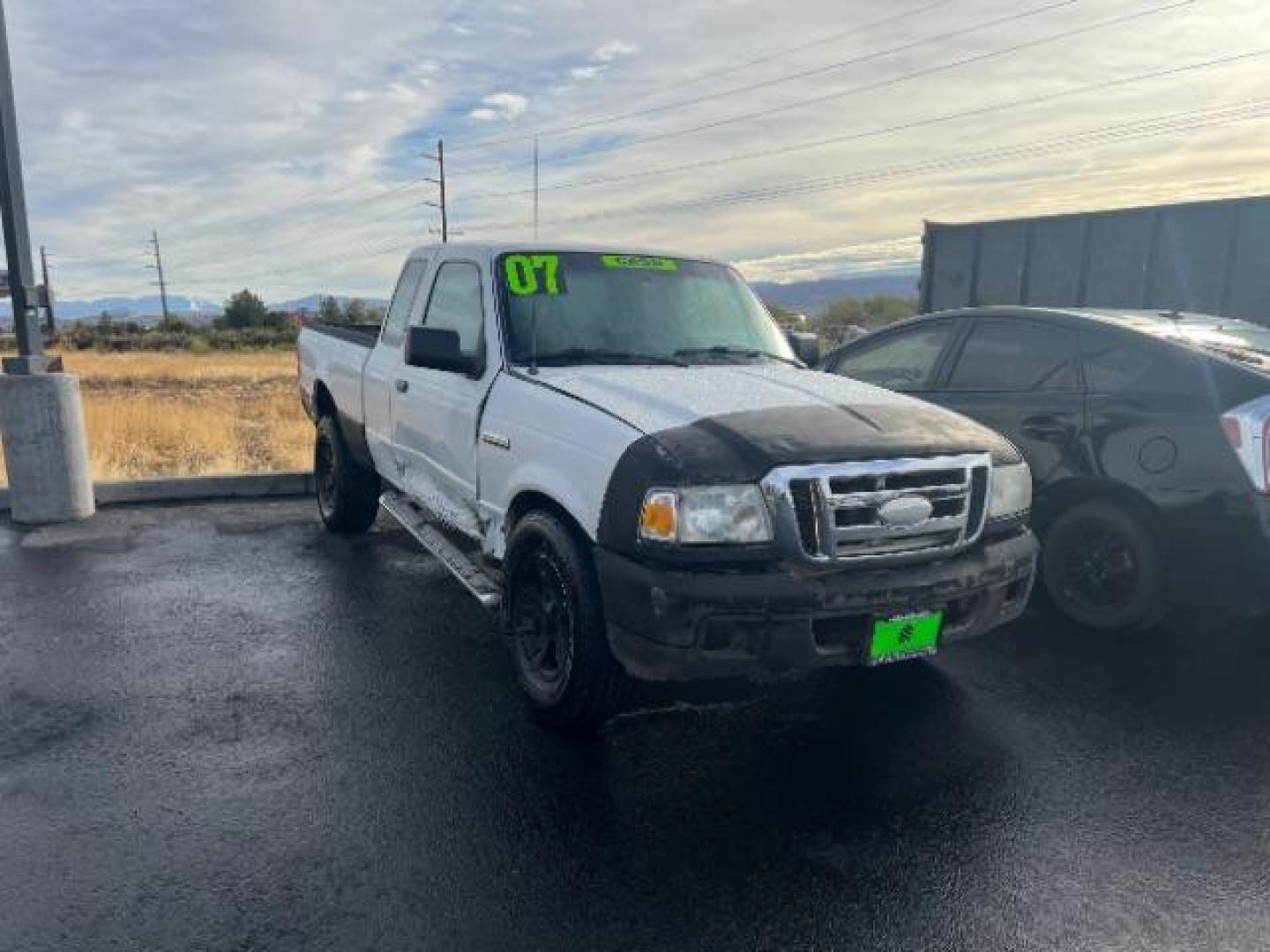 2007 Oxford White /Medium Dark Flint Cloth Interior Ford Ranger XL SuperCab 2WD (1FTYR14DX7P) with an 2.3L L4 SOHC 8V engine, 5-Speed Manual transmission, located at 1865 East Red Hills Pkwy, St. George, 84770, (435) 628-0023, 37.120850, -113.543640 - This vehicle is a Wholesale Special. This means it will need some love. Runs a drives fine but has body damage, leaks or other mechanical issues. It did NOT pass our 50 point inspection. Get a great deal on a less than perfect car. These cars do NOT qualify for our in house financing. Cash and carry - Photo#0