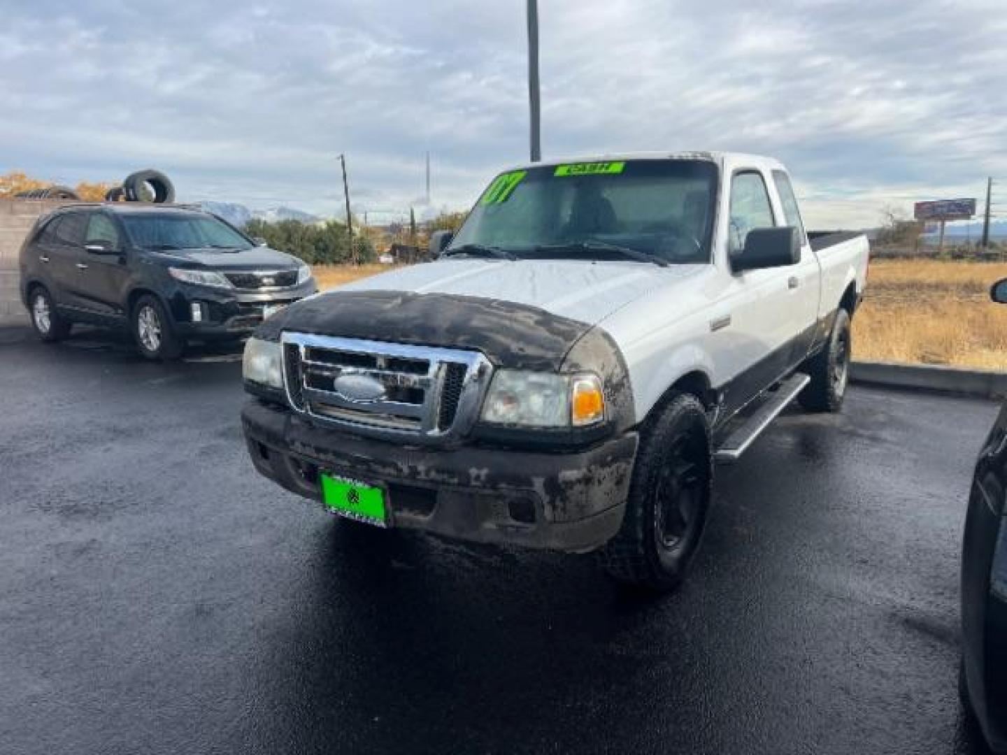 2007 Oxford White /Medium Dark Flint Cloth Interior Ford Ranger XL SuperCab 2WD (1FTYR14DX7P) with an 2.3L L4 SOHC 8V engine, 5-Speed Manual transmission, located at 1865 East Red Hills Pkwy, St. George, 84770, (435) 628-0023, 37.120850, -113.543640 - This vehicle is a Wholesale Special. This means it will need some love. Runs a drives fine but has body damage, leaks or other mechanical issues. It did NOT pass our 50 point inspection. Get a great deal on a less than perfect car. These cars do NOT qualify for our in house financing. Cash and carry - Photo#2