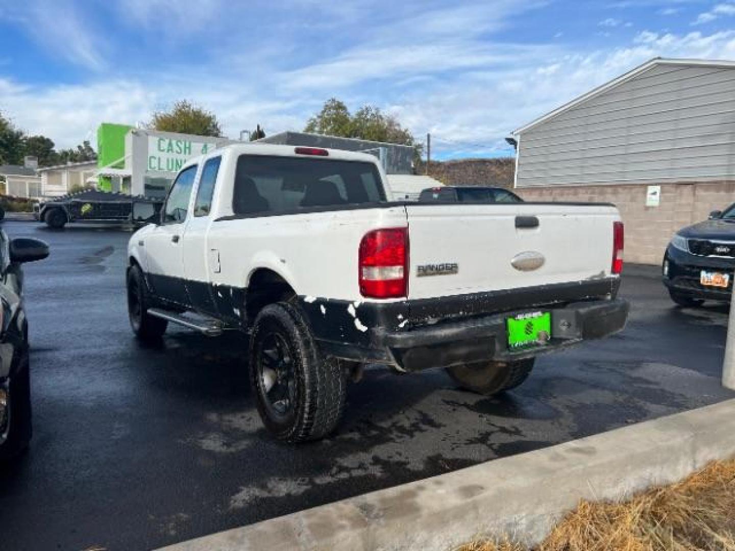 2007 Oxford White /Medium Dark Flint Cloth Interior Ford Ranger XL SuperCab 2WD (1FTYR14DX7P) with an 2.3L L4 SOHC 8V engine, 5-Speed Manual transmission, located at 1865 East Red Hills Pkwy, St. George, 84770, (435) 628-0023, 37.120850, -113.543640 - This vehicle is a Wholesale Special. This means it will need some love. Runs a drives fine but has body damage, leaks or other mechanical issues. It did NOT pass our 50 point inspection. Get a great deal on a less than perfect car. These cars do NOT qualify for our in house financing. Cash and carry - Photo#3