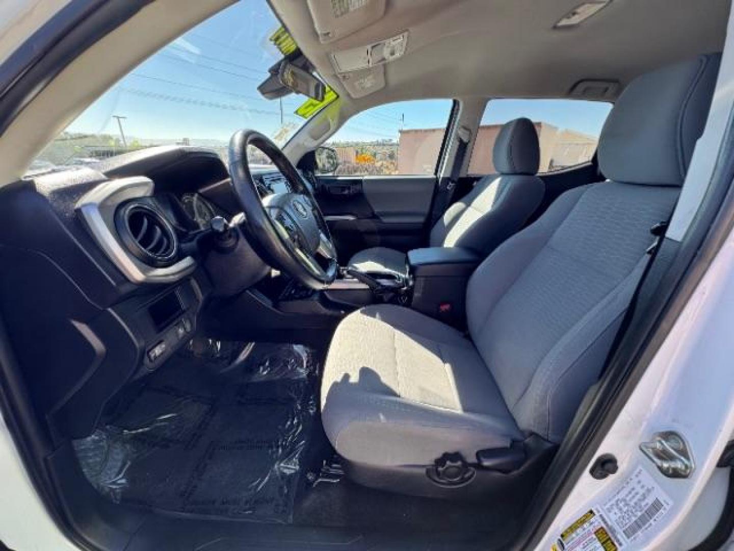 2019 Super White /Cement Gray, cloth Toyota Tacoma SR5 Double Cab Long Bed I4 6AT 2WD (5TFAX5GN5KX) with an 2.7L L4 DOHC 16V engine, 6-Speed Automatic transmission, located at 1865 East Red Hills Pkwy, St. George, 84770, (435) 628-0023, 37.120850, -113.543640 - Photo#17