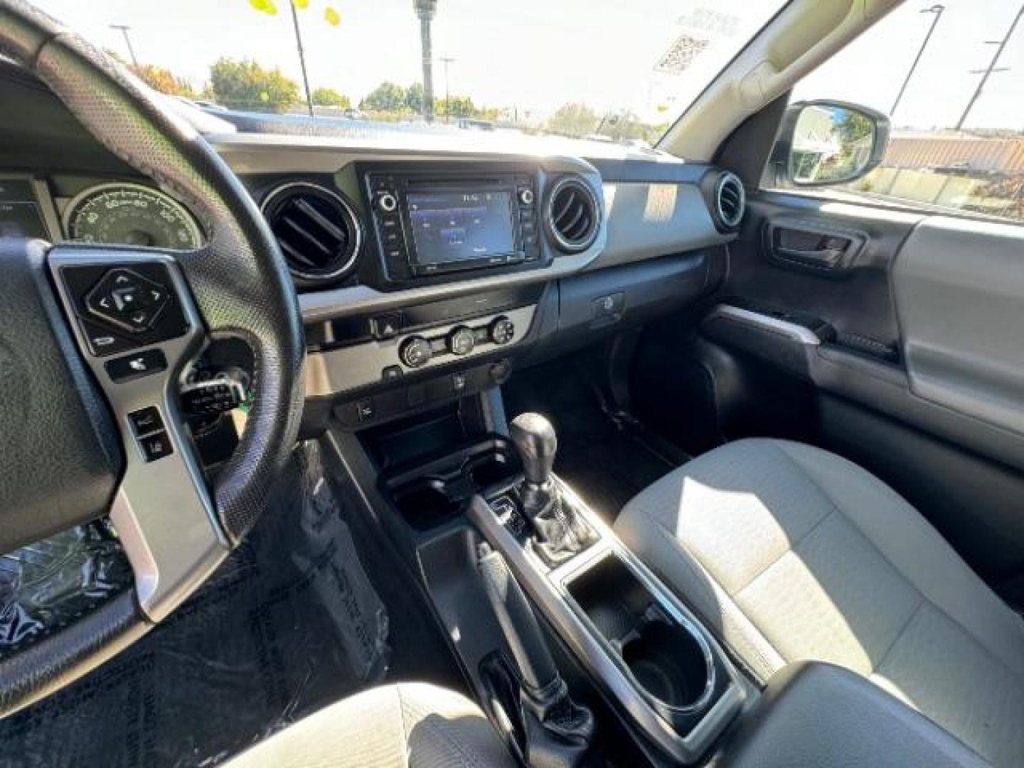 2019 Super White /Cement Gray, cloth Toyota Tacoma SR5 Double Cab Long Bed I4 6AT 2WD (5TFAX5GN5KX) with an 2.7L L4 DOHC 16V engine, 6-Speed Automatic transmission, located at 1865 East Red Hills Pkwy, St. George, 84770, (435) 628-0023, 37.120850, -113.543640 - Photo#19