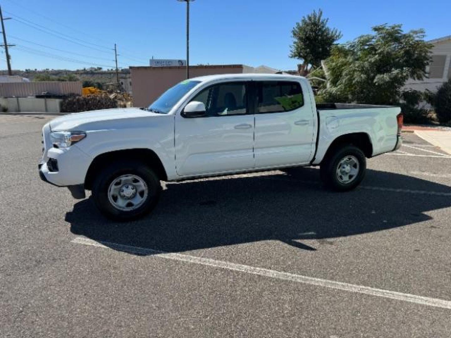 2019 Super White /Cement Gray, cloth Toyota Tacoma SR5 Double Cab Long Bed I4 6AT 2WD (5TFAX5GN5KX) with an 2.7L L4 DOHC 16V engine, 6-Speed Automatic transmission, located at 1865 East Red Hills Pkwy, St. George, 84770, (435) 628-0023, 37.120850, -113.543640 - Photo#5