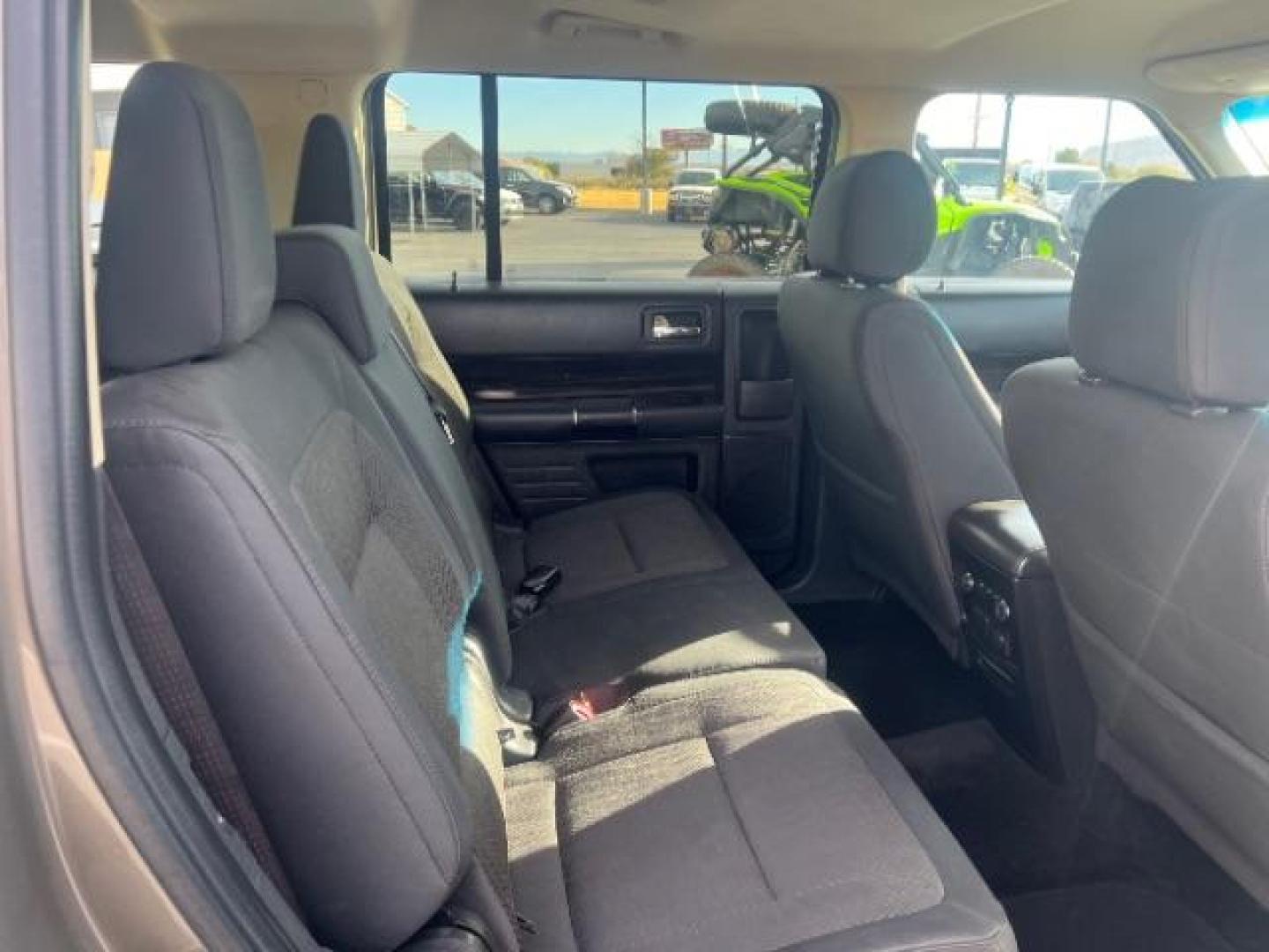 2013 Mineral Gray Metalli /Charcoal Black Cloth Ford Flex SEL FWD (2FMGK5C88DB) with an 3.5L V6 DOHC 24V engine, 6-Speed Automatic Ov transmission, located at 1865 East Red Hills Pkwy, St. George, 84770, (435) 628-0023, 37.120850, -113.543640 - Photo#31