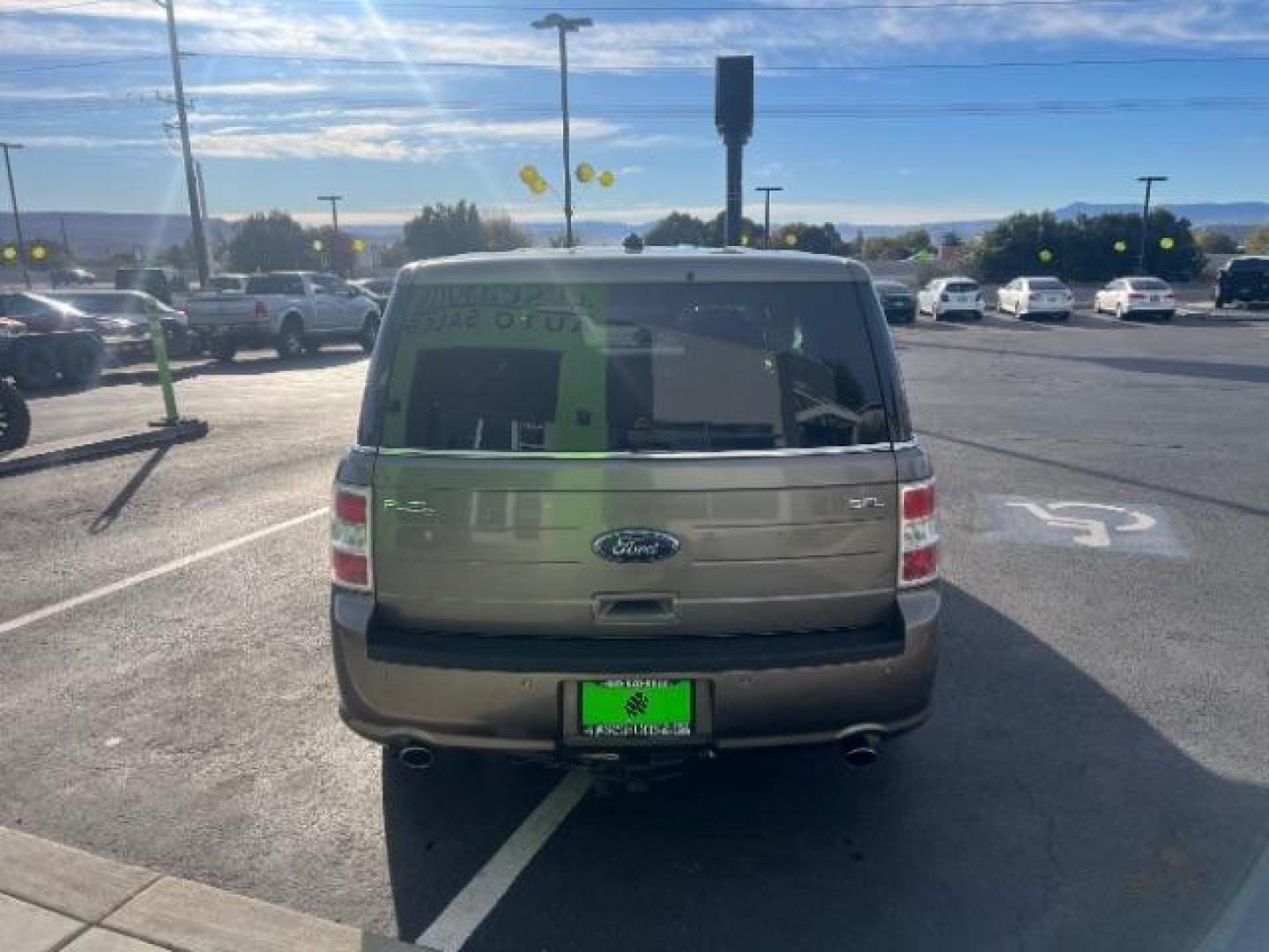 2013 Mineral Gray Metalli /Charcoal Black Cloth Ford Flex SEL FWD (2FMGK5C88DB) with an 3.5L V6 DOHC 24V engine, 6-Speed Automatic Ov transmission, located at 1865 East Red Hills Pkwy, St. George, 84770, (435) 628-0023, 37.120850, -113.543640 - Photo#5