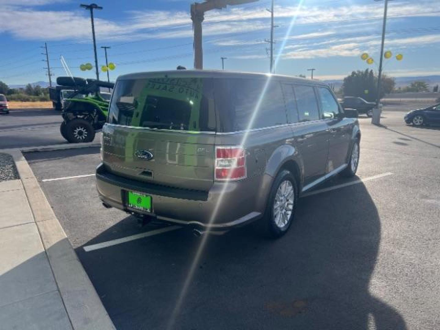 2013 Mineral Gray Metalli /Charcoal Black Cloth Ford Flex SEL FWD (2FMGK5C88DB) with an 3.5L V6 DOHC 24V engine, 6-Speed Automatic Ov transmission, located at 1865 East Red Hills Pkwy, St. George, 84770, (435) 628-0023, 37.120850, -113.543640 - Photo#6