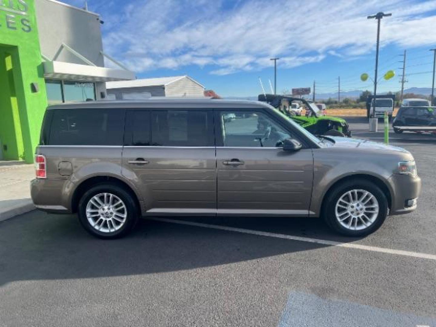 2013 Mineral Gray Metalli /Charcoal Black Cloth Ford Flex SEL FWD (2FMGK5C88DB) with an 3.5L V6 DOHC 24V engine, 6-Speed Automatic Ov transmission, located at 1865 East Red Hills Pkwy, St. George, 84770, (435) 628-0023, 37.120850, -113.543640 - Photo#7