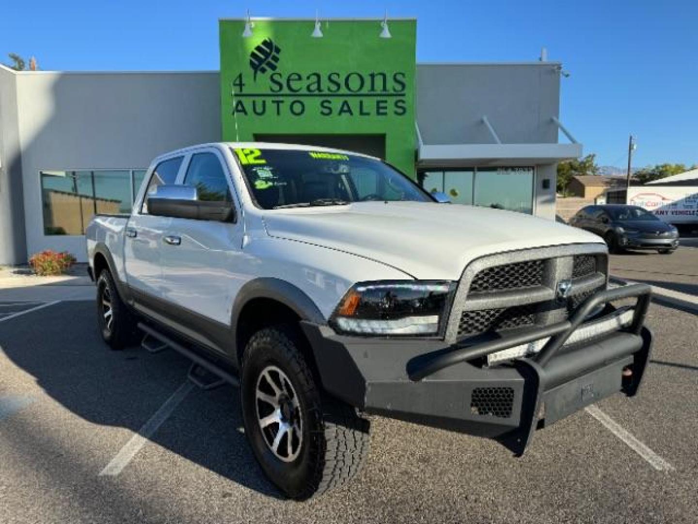 2012 Bright White /Dark Slate Leather Interior RAM 1500 Laramie Crew Cab 4WD (1C6RD7NTXCS) with an 5.7L V8 OHV 16V engine, 6-Speed Automatic transmission, located at 1865 East Red Hills Pkwy, St. George, 84770, (435) 628-0023, 37.120850, -113.543640 - Photo#0