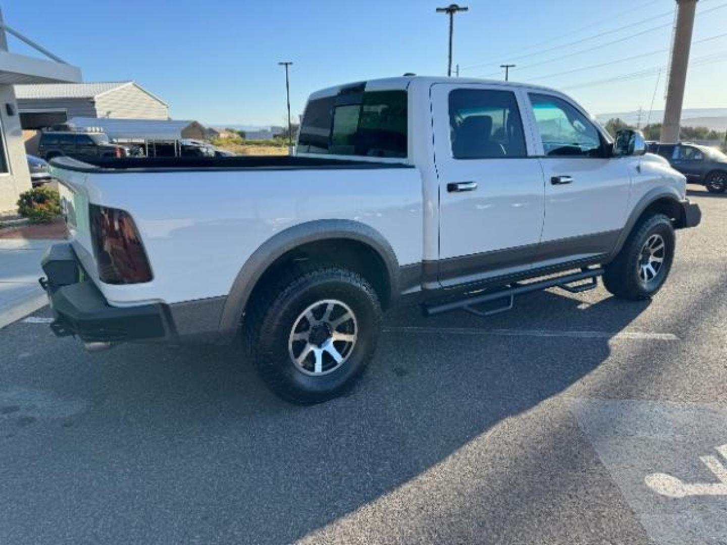 2012 Bright White /Dark Slate Leather Interior RAM 1500 Laramie Crew Cab 4WD (1C6RD7NTXCS) with an 5.7L V8 OHV 16V engine, 6-Speed Automatic transmission, located at 1865 East Red Hills Pkwy, St. George, 84770, (435) 628-0023, 37.120850, -113.543640 - Photo#11