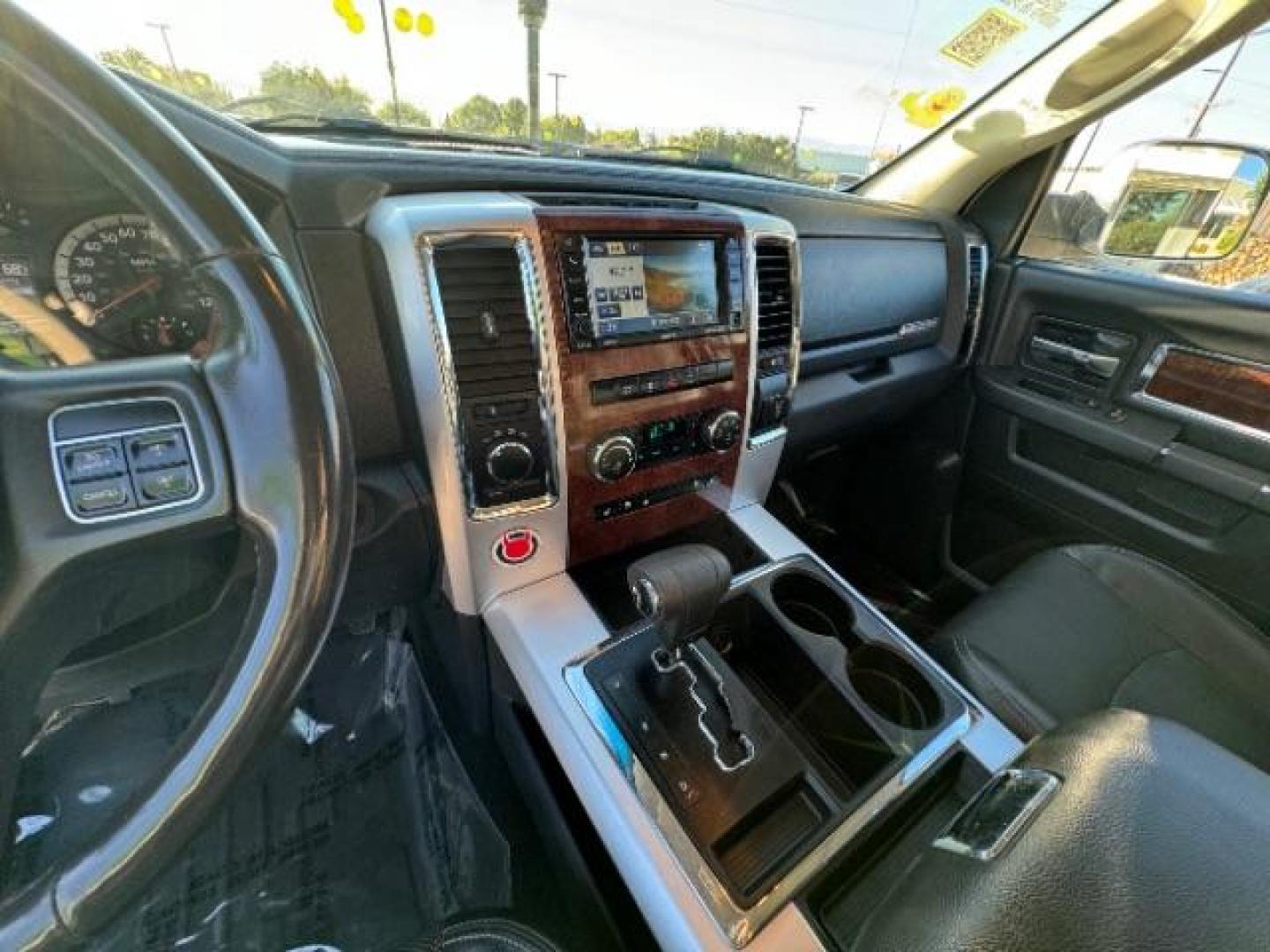 2012 Bright White /Dark Slate Leather Interior RAM 1500 Laramie Crew Cab 4WD (1C6RD7NTXCS) with an 5.7L V8 OHV 16V engine, 6-Speed Automatic transmission, located at 1865 East Red Hills Pkwy, St. George, 84770, (435) 628-0023, 37.120850, -113.543640 - Photo#24