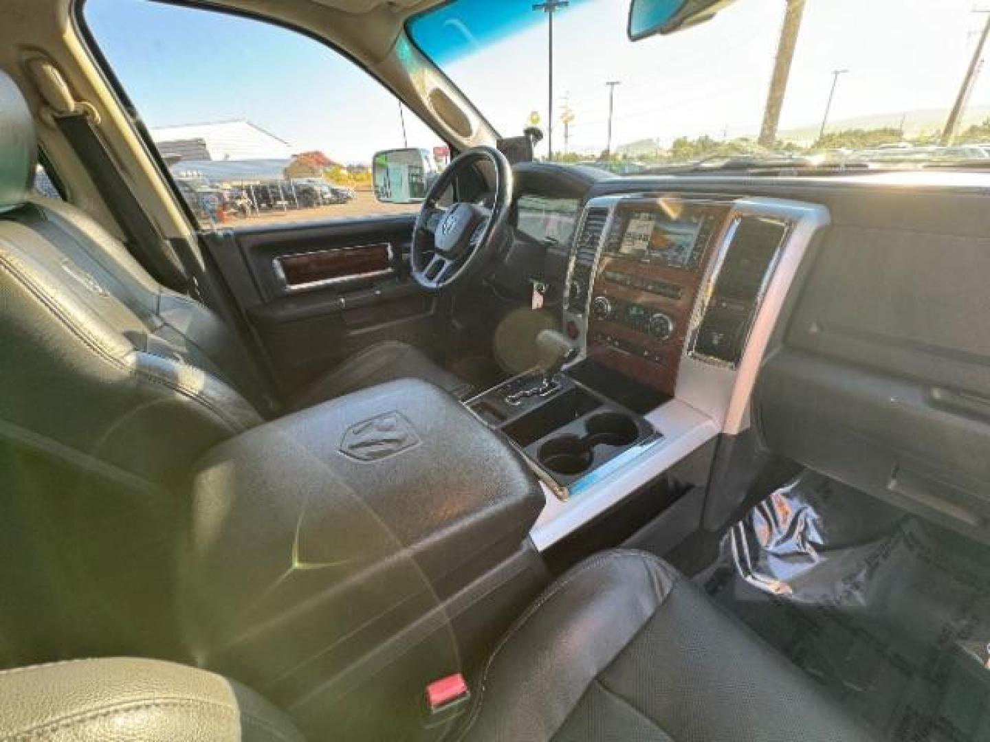 2012 Bright White /Dark Slate Leather Interior RAM 1500 Laramie Crew Cab 4WD (1C6RD7NTXCS) with an 5.7L V8 OHV 16V engine, 6-Speed Automatic transmission, located at 1865 East Red Hills Pkwy, St. George, 84770, (435) 628-0023, 37.120850, -113.543640 - Photo#42